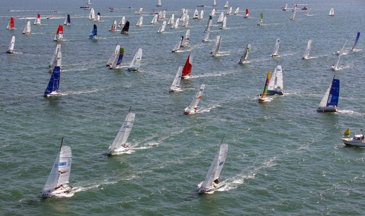 Skippers take the start of the 16th edition of the Mini-transat sailing race from La Rochelle, western France, to Salvador da Bahia, Brazil, 18 September 2007, off the coast of La Rochelle.