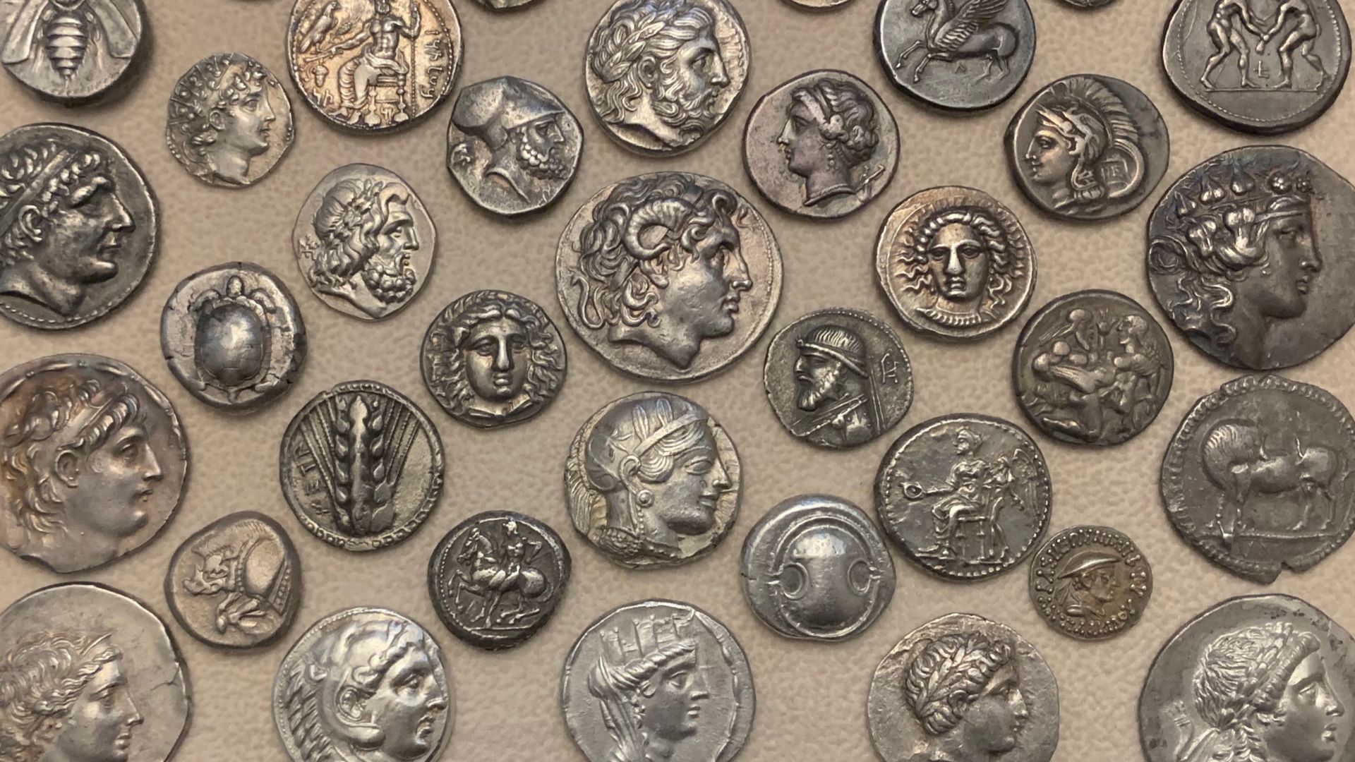 Different silver denominations (drachm, nomos, stater, didrachm, tetradrachm) from different ancient Greek city-states.