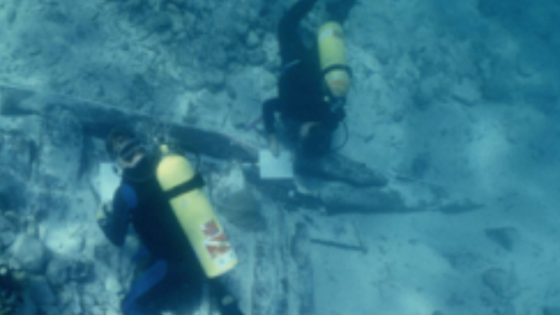 Navy archaeologists map an early 19th century shipwreck.  From Underwater Archaeology Branch, Naval History & Heritage Command