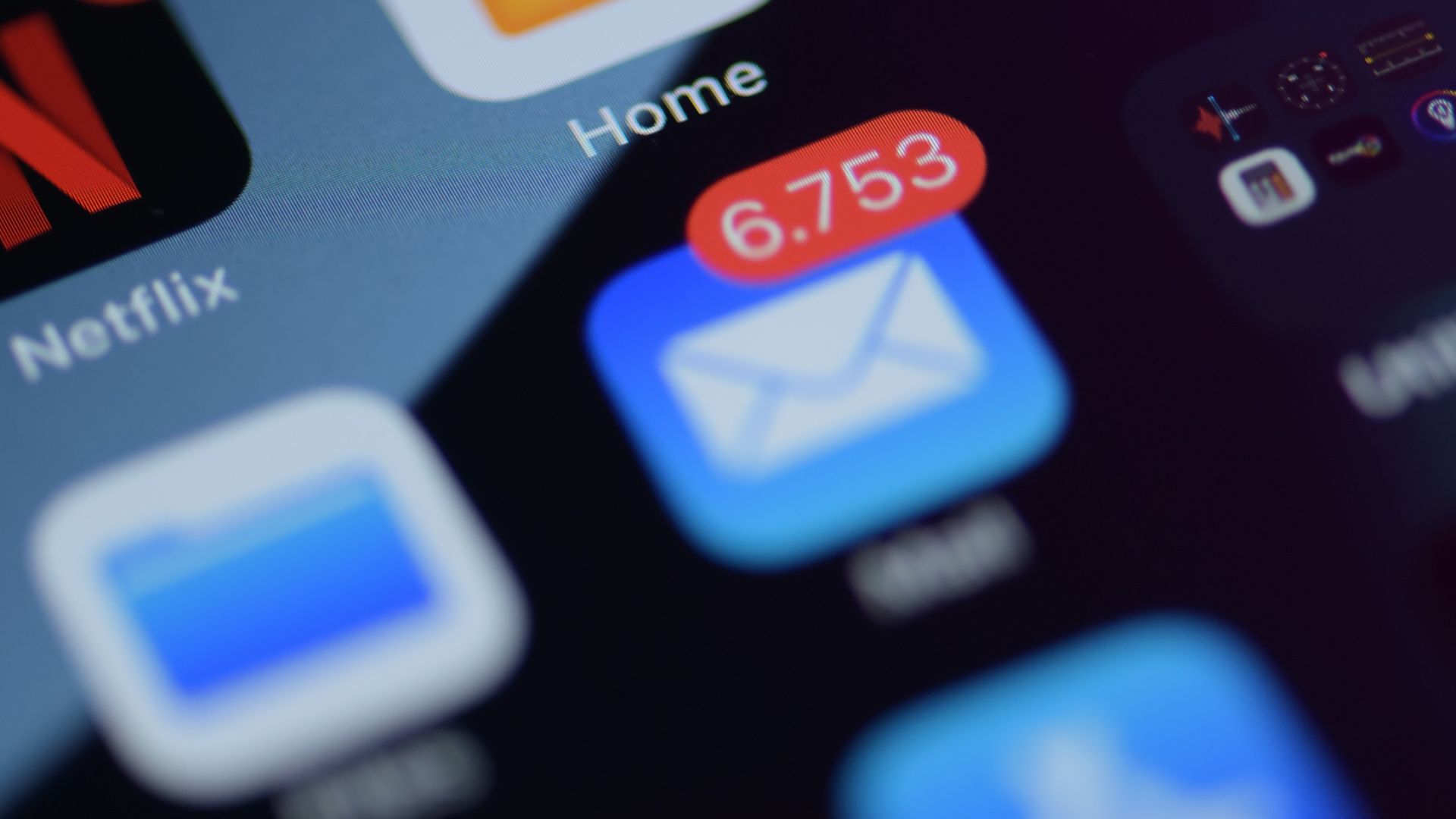 a close up of a cell phone with various app icons