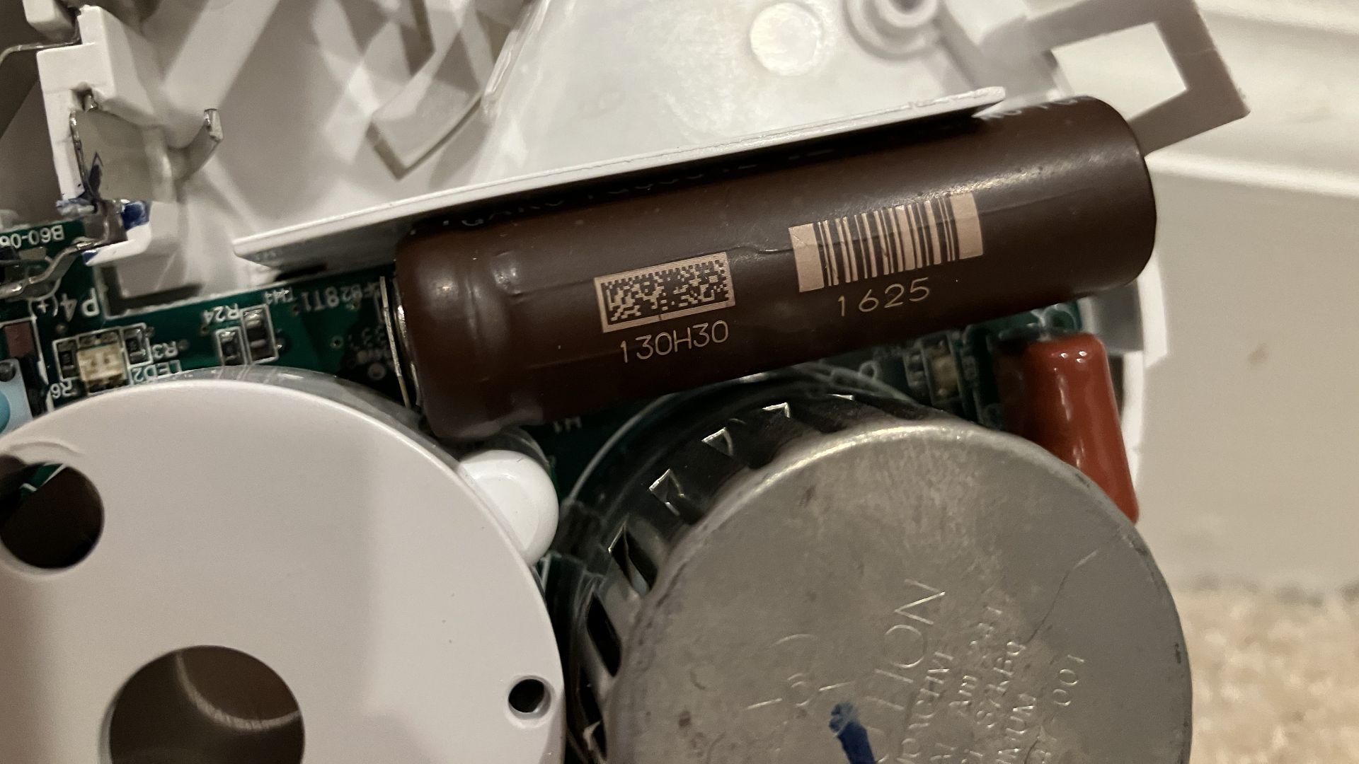 Electrochemical Carbon Monoxide sensor from a First Alert Smoke+CO alarm (brown cylinder).