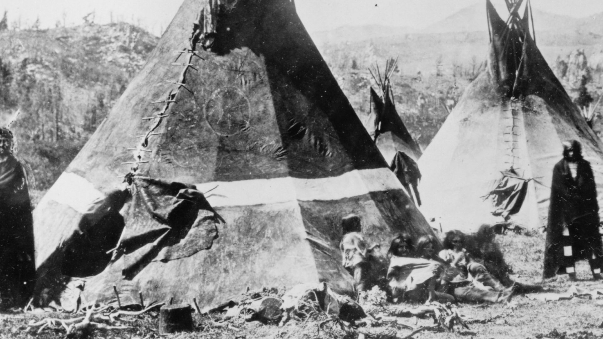 A Shoshone encampment in the Wind River Mountains of Wyoming, photographed by W. H. Jackson, 1870.  See variation from Smithsonian Institution, National Anthropological Archives [#1668] here: [1]
TITLE:  Shoshoni Indians--Skin tepies [sic]
CALL NUMBER:  L