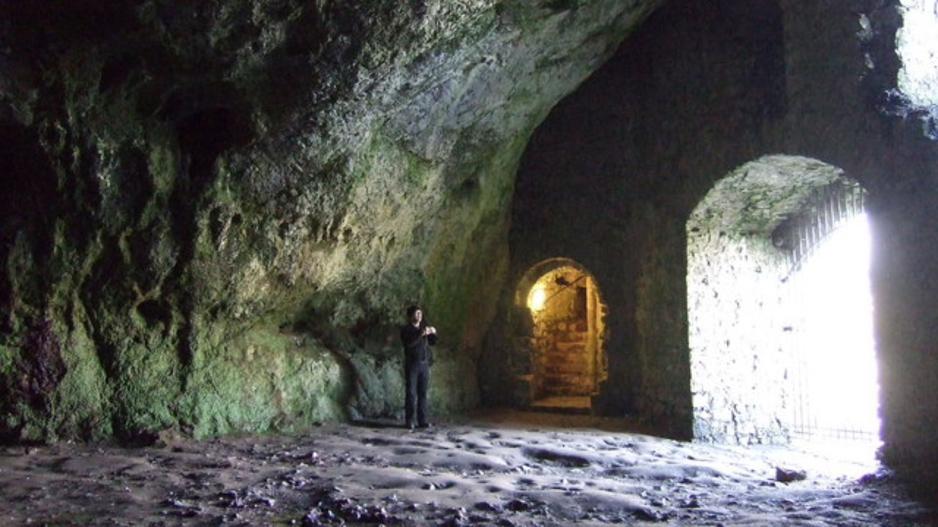 The Wogan, Pembroke castle A huge natural cavern beneath the castle: it was probably used prehistorically and by the Romans, before the Normans partially walled up the opening and added a stone staircase which leads into the castle above. The opening, rig