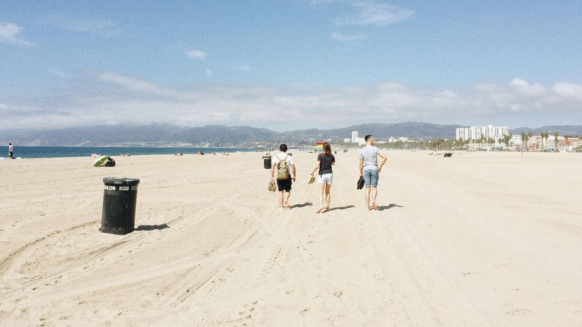 people walking on beach during daytime