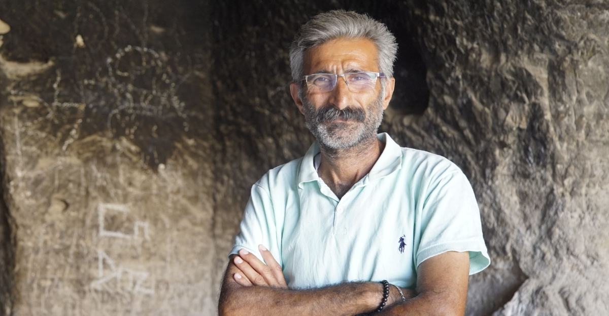 portrait-of-man-in-rock-cave