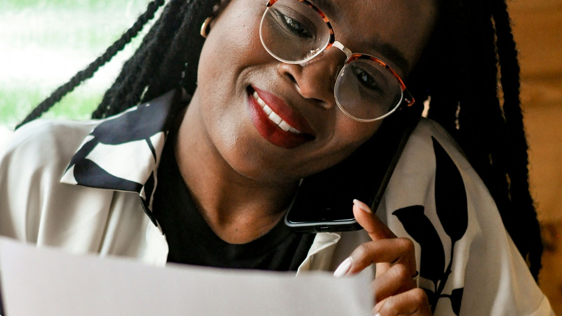 a person holding a paper