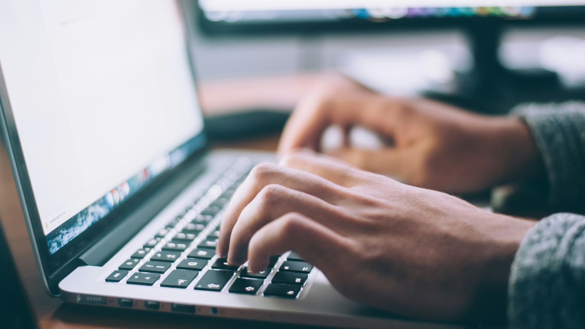 person using MacBook Pro