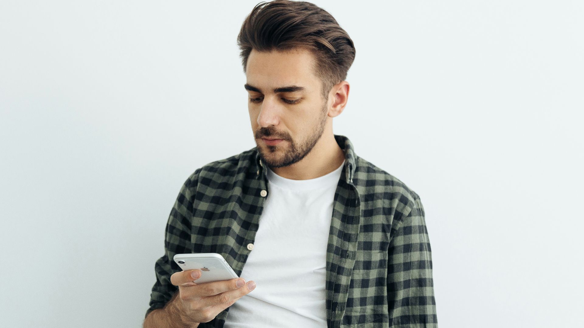 man using iPhone