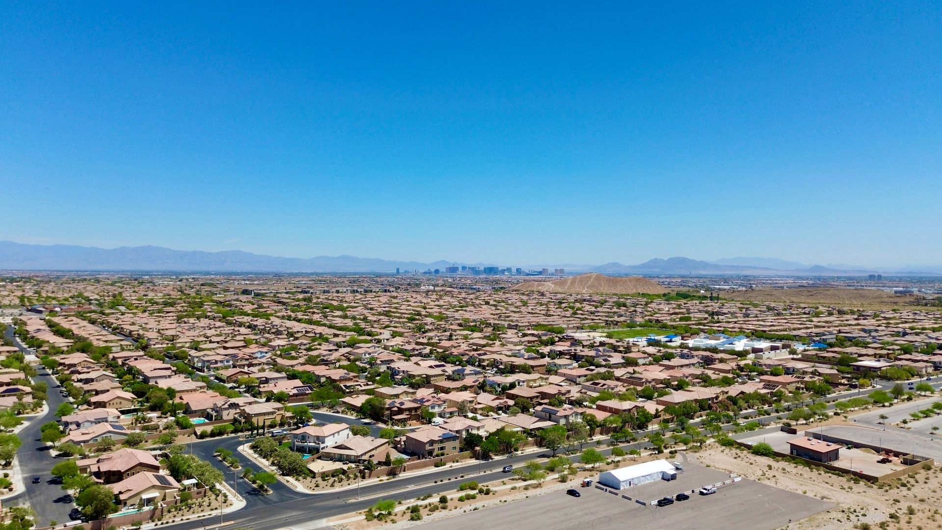 an aerial view of a neighborhood in the desert