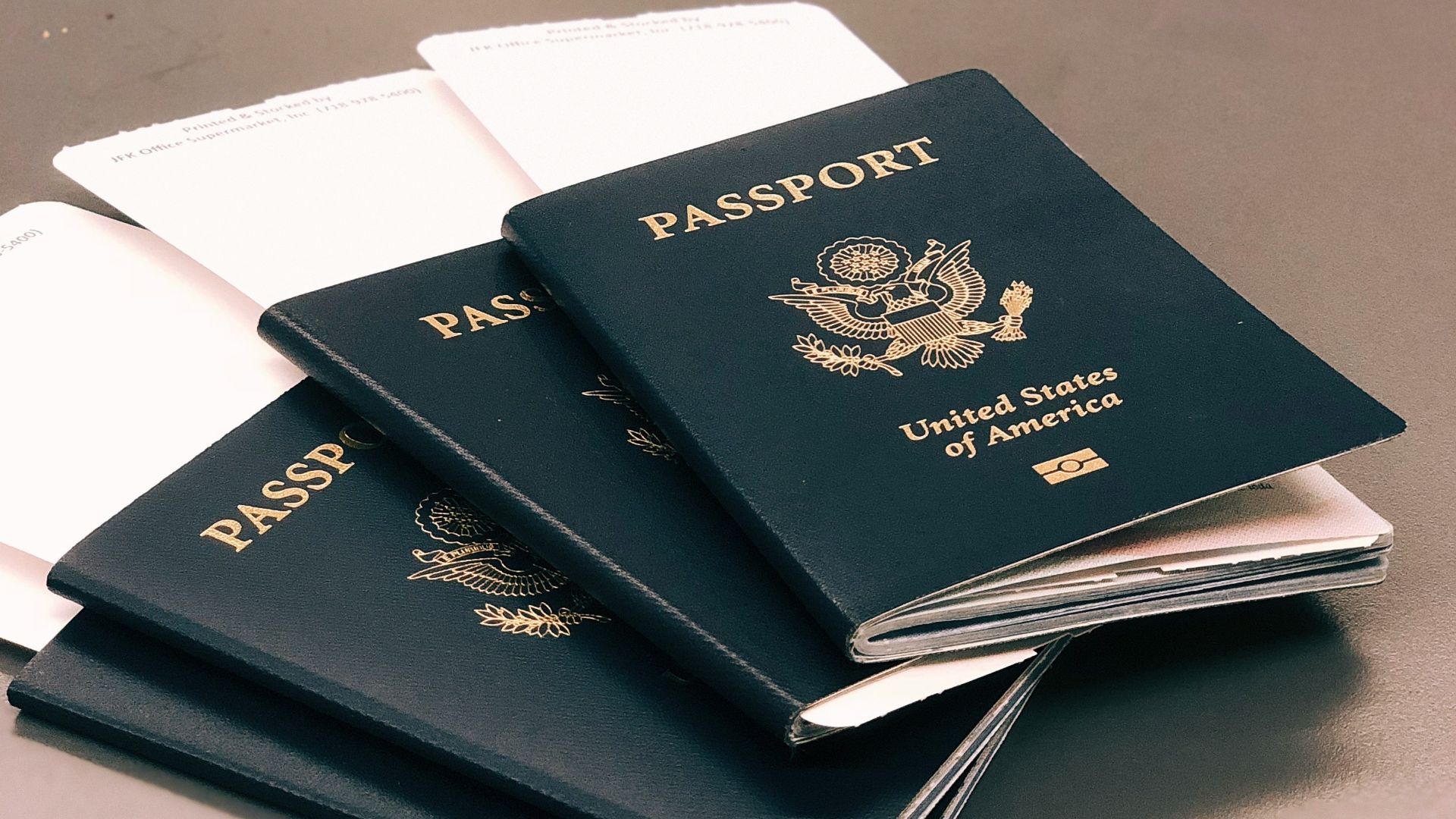four green Passports