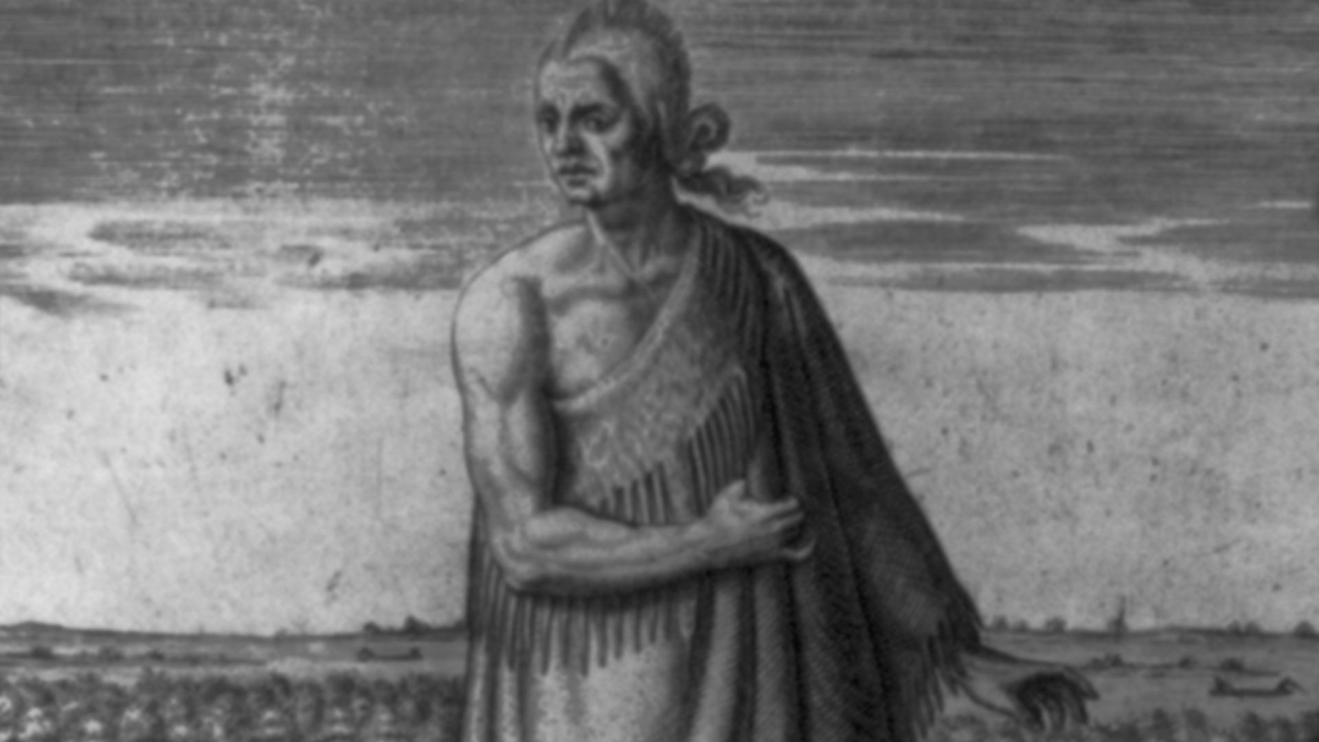 An aged Native man from Pomeiock, full-length portrait, facing front, wearing winter garment; landscape scene with village in the background.