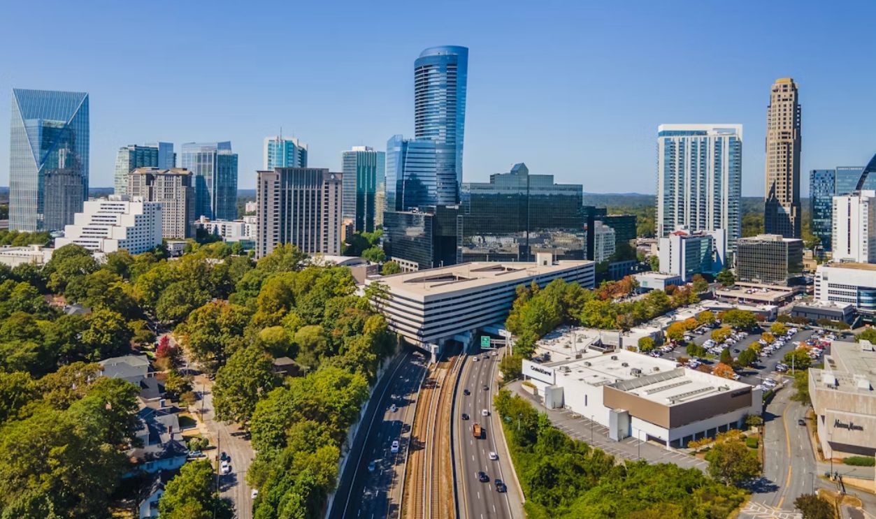 An aerial view of a city with tall buildings