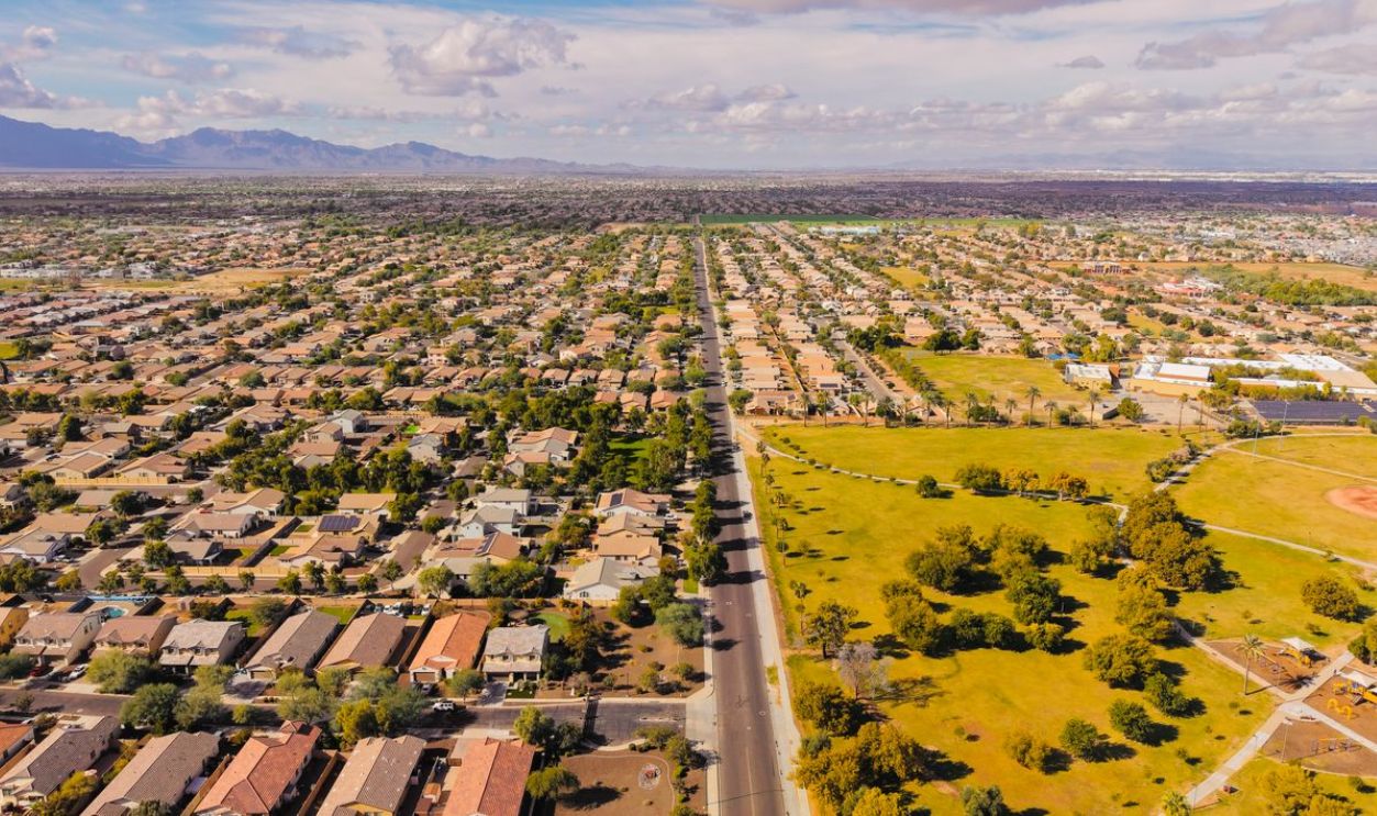 Stunning aerial view of a suburban neighborhood in Arizona with clear skies