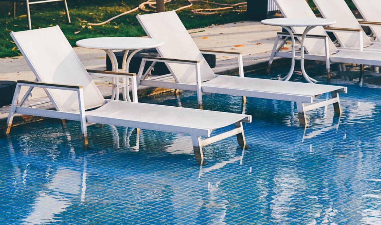 Women In Pool Chair (2)