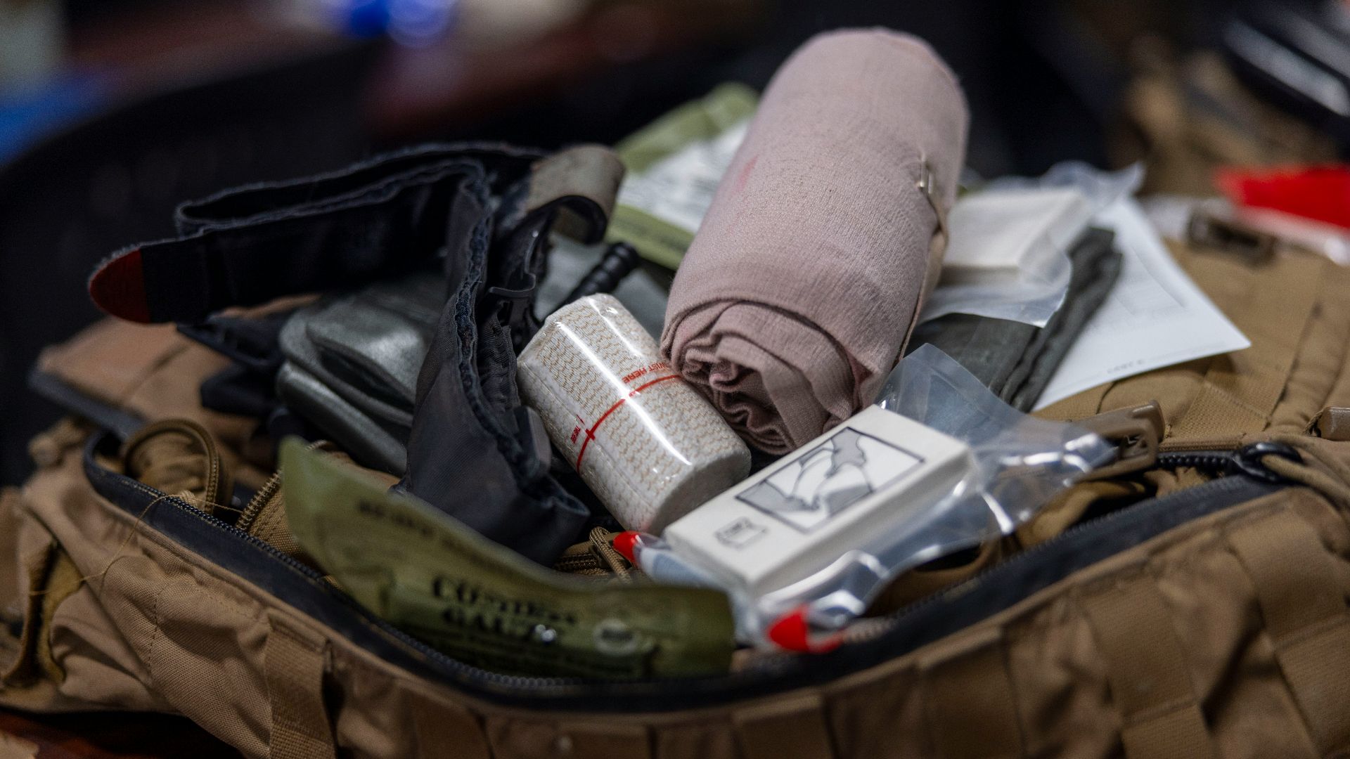 First aid kit contents with bandages and medical supplies