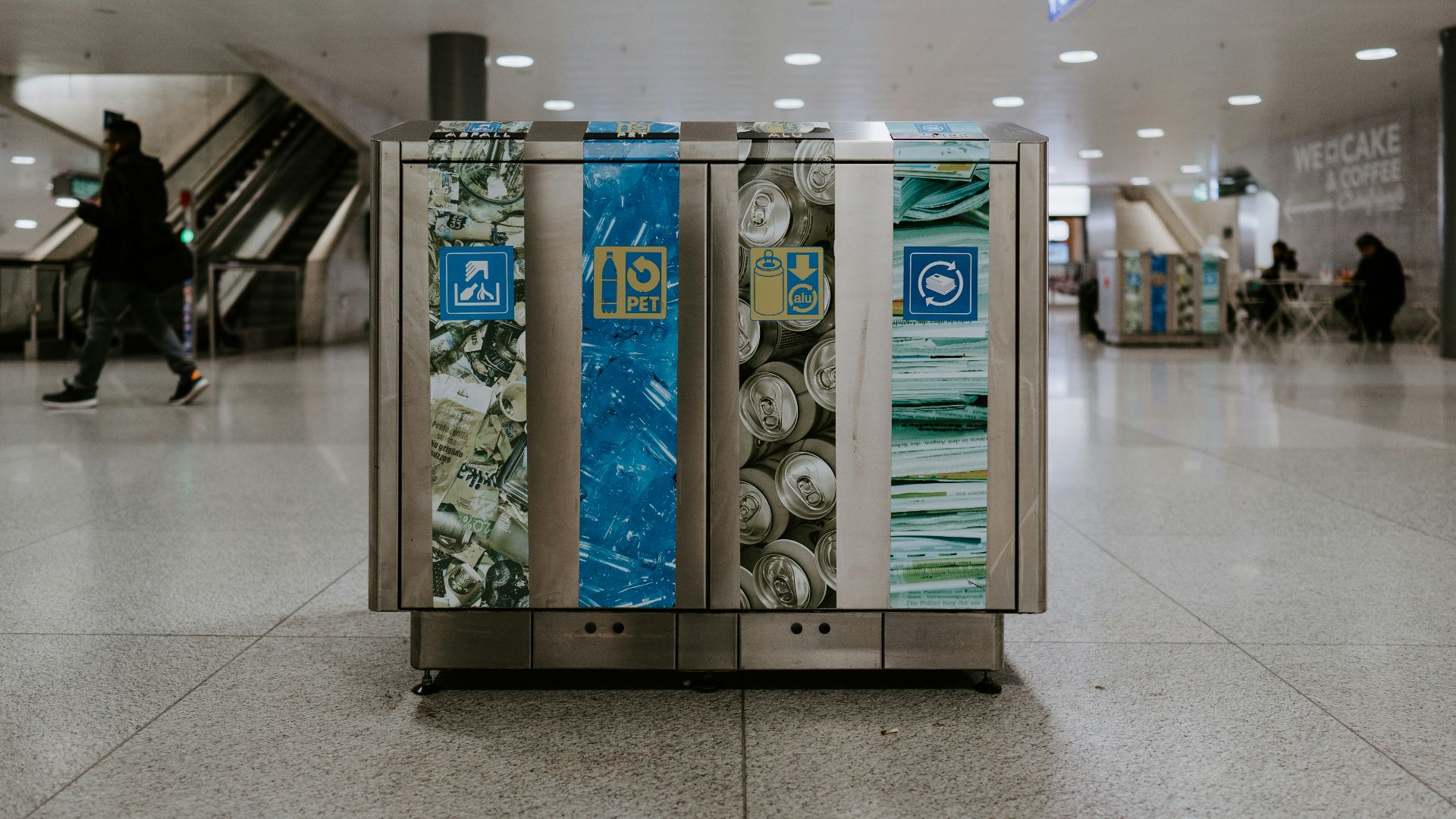 a couple of boxes sitting on top of a tiled floor
