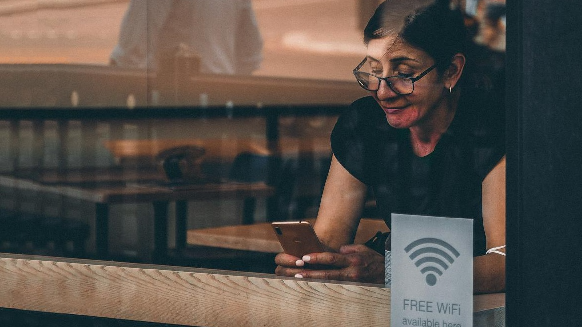 Woman Using a Smartphone Inside a Store
