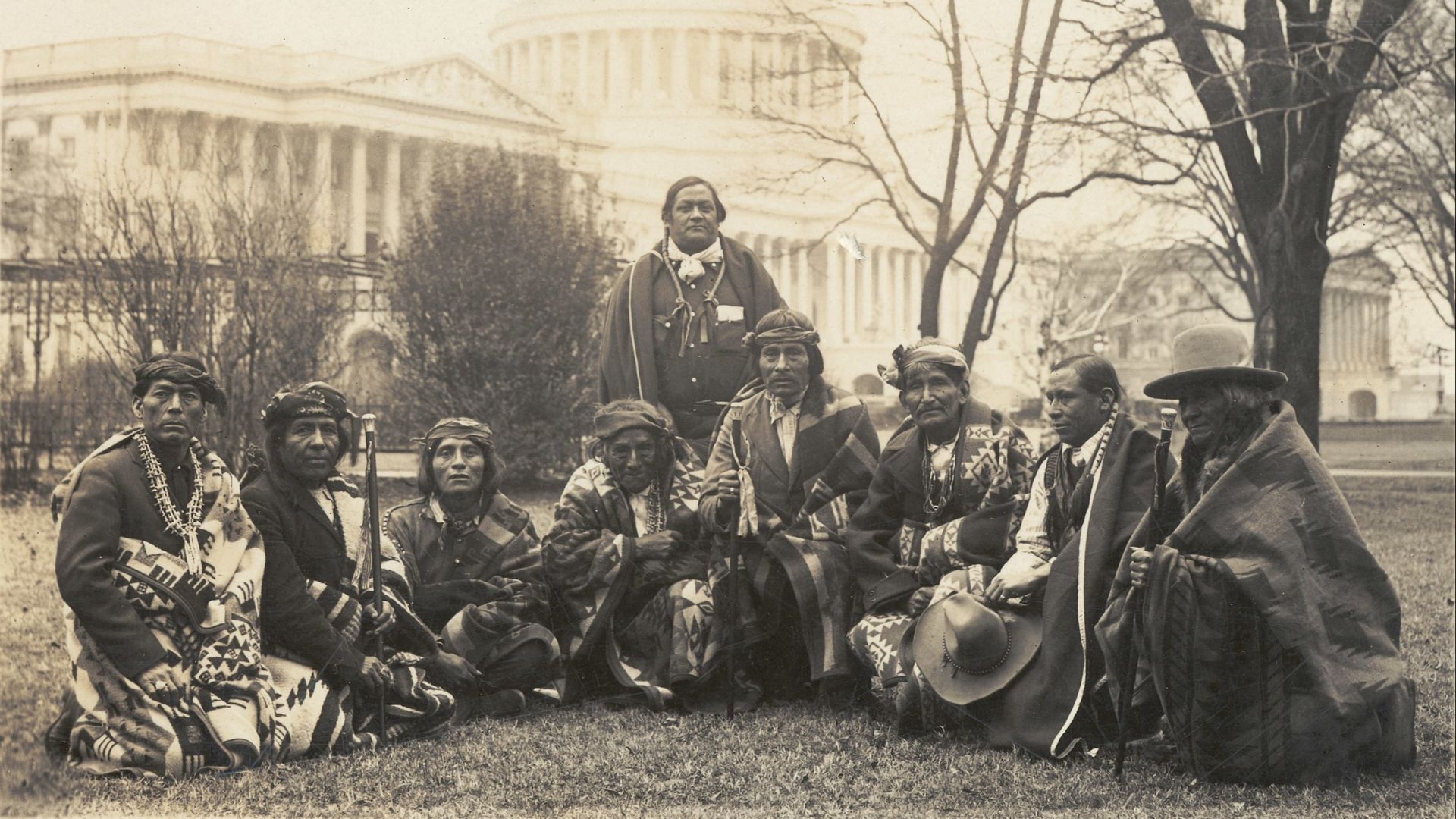 Title: Group of Pueblo Indians photographed at the U.S. Capitol today. This is the first time since the Lincoln Administration that the Pueblo Indians have sent a delegation to Wash. They appeared before the Senate Lands Committee
Abstract/medium: 1 photo