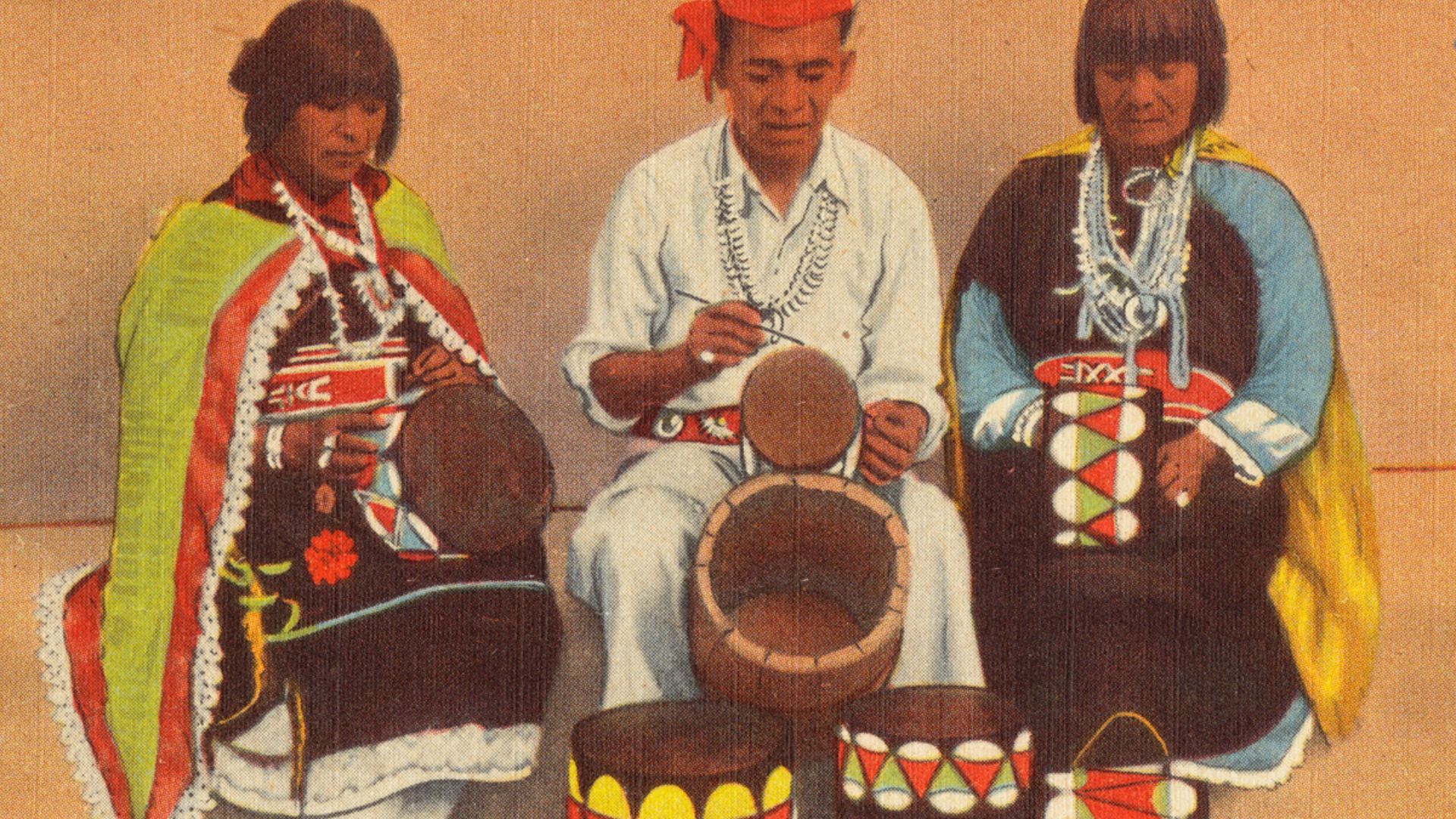 File name: 06_10_015552
Title: Pueblo Indians making hollow log drums
Created/Published: Alfred Mc Garr Adv. Ser., Albuquerque, N. M.
Date issued: 1930 - 1945 (approximate)
Physical description: 1 print (postcard) : linen texture, color ; 3 1/2 x 5 1/2 in