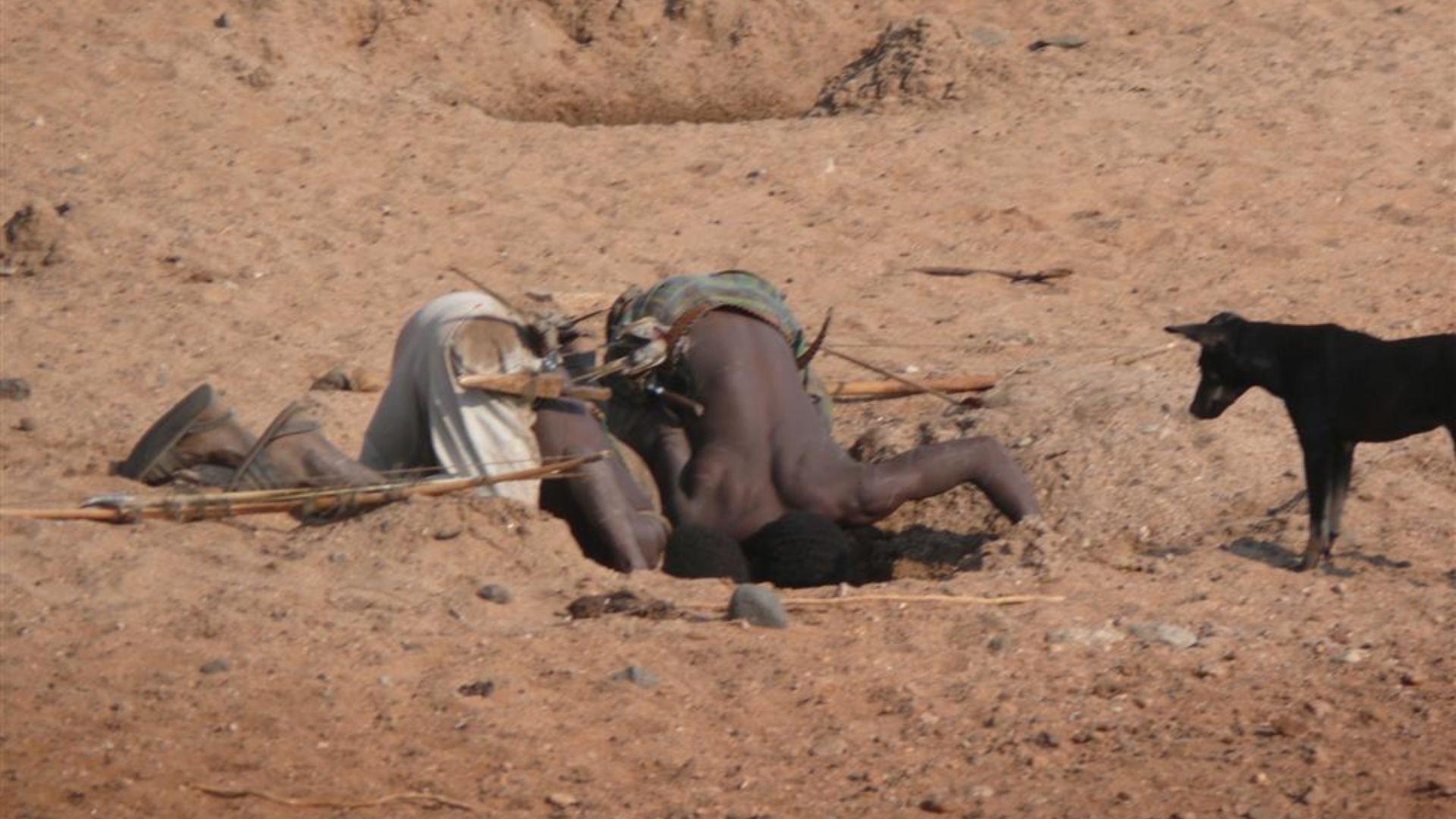 Hadzabe hunters drinking water
