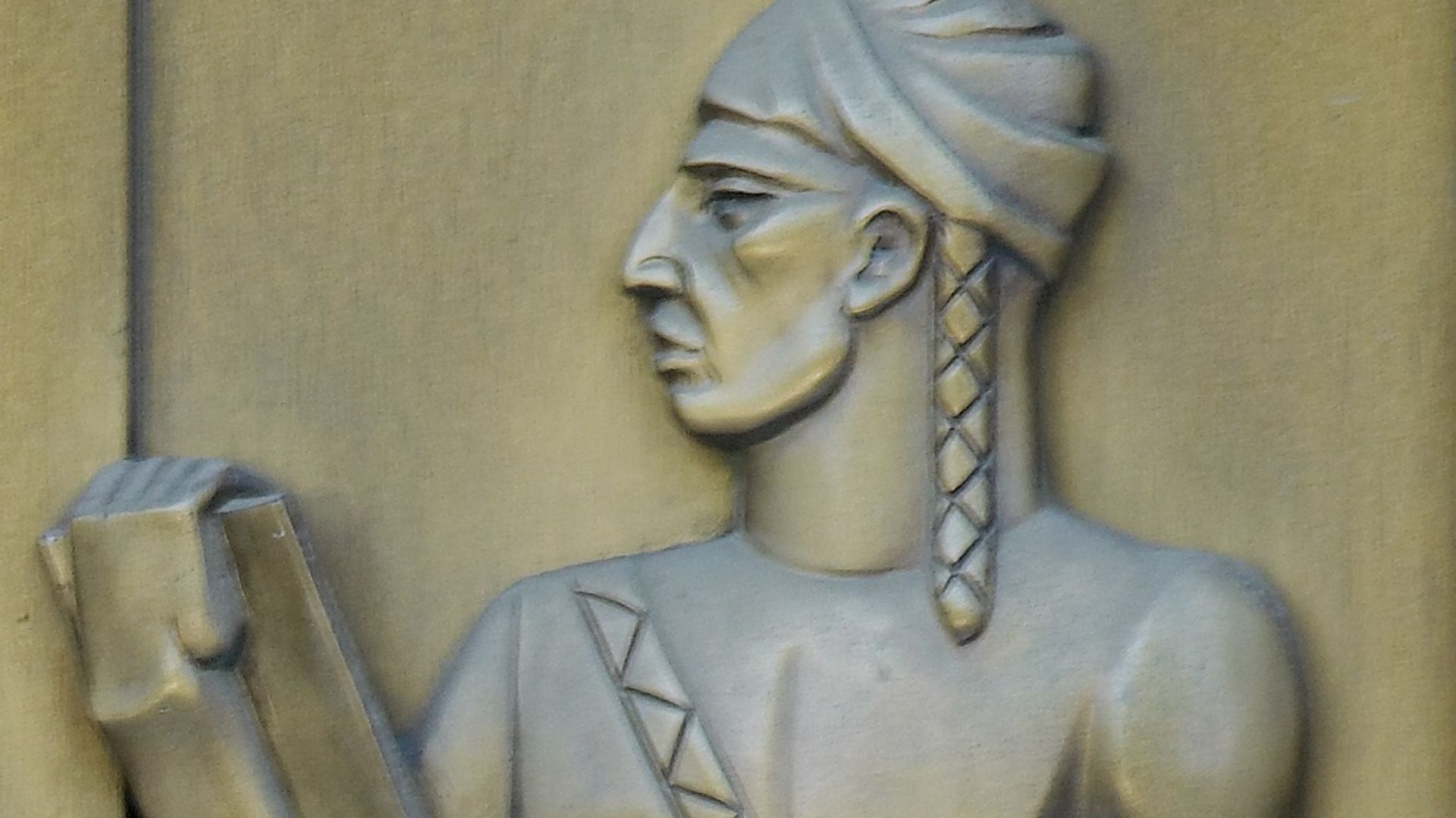 highly stylized portrayal of Sequoyah, sculpted bronze figure by Lee Lawrie. Door detail, east entrance, Library of Congress John Adams Building, Washington, D.C.