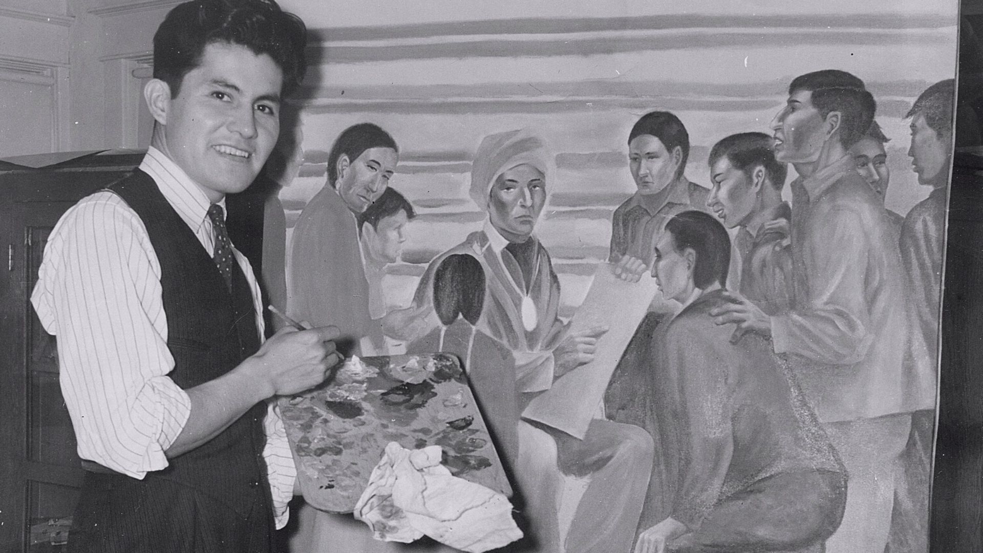 Franklin Gritts painting Sequoyah.  
Photograph of the Cherokee artist, Franklin Gritts, painting an oil in 1941. He took this self-portrait photo for his own use.  The oil may be one that he painted for Haskell Indian University in Lawrence, KS. The oil 