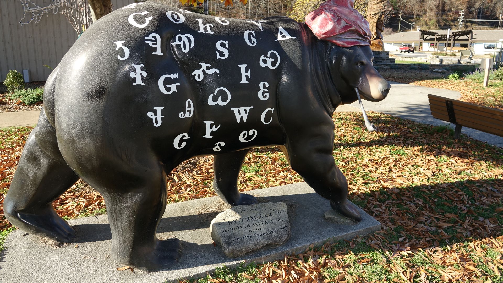 Bear statue by Charles Saunooke displaying the Sequoyah Syllabary, outside the Museum of the Cherokee People in Cherokee, North Carolina, 2017