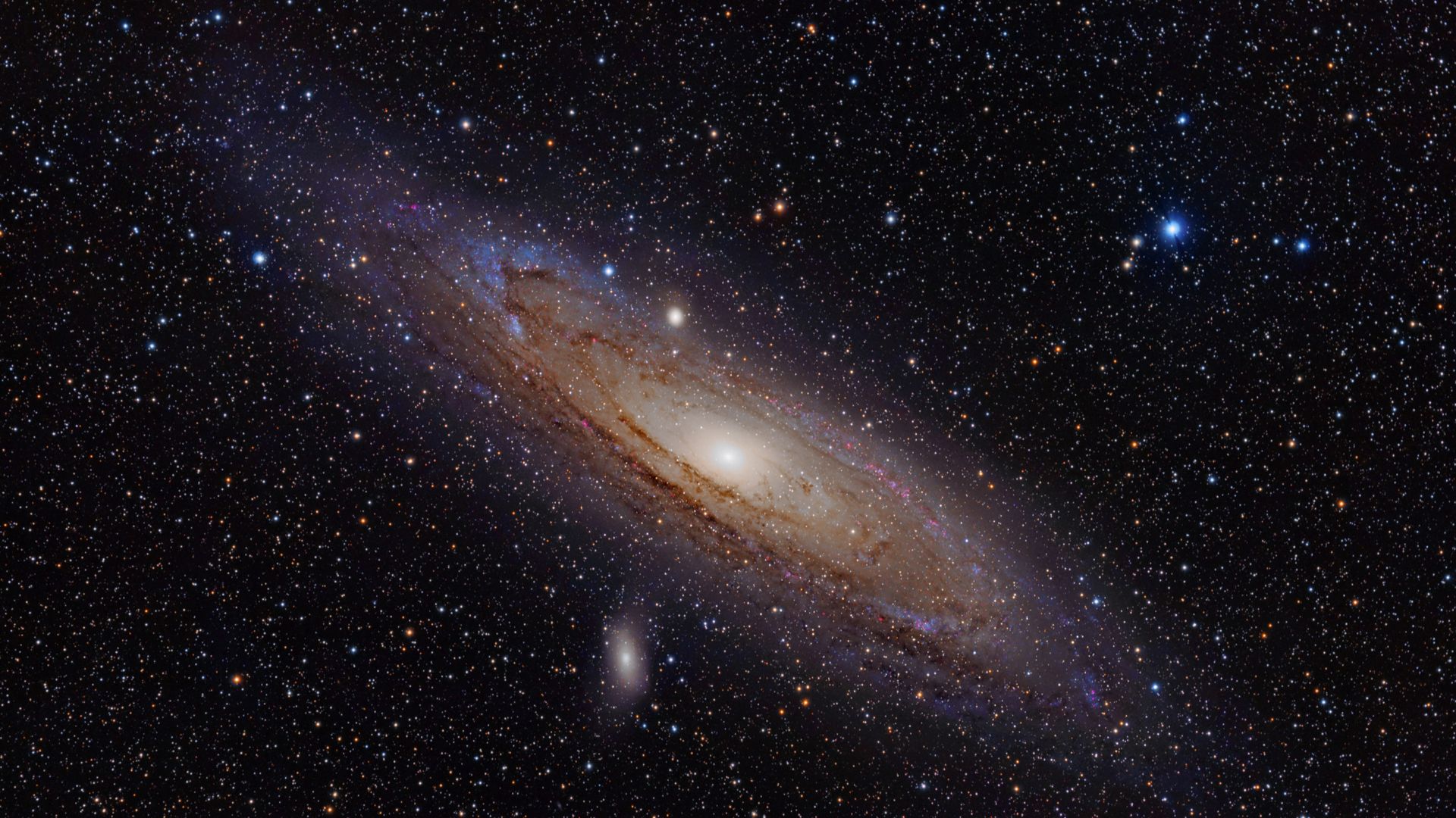 The Andromeda Galaxy is a spiral galaxy approximately 2.5 million light-years away in the constellation Andromeda. The image also shows Messier Objects 32 and 110, as well as NGC 206 (a bright star cloud in the Andromeda Galaxy) and the star Nu Andromedae