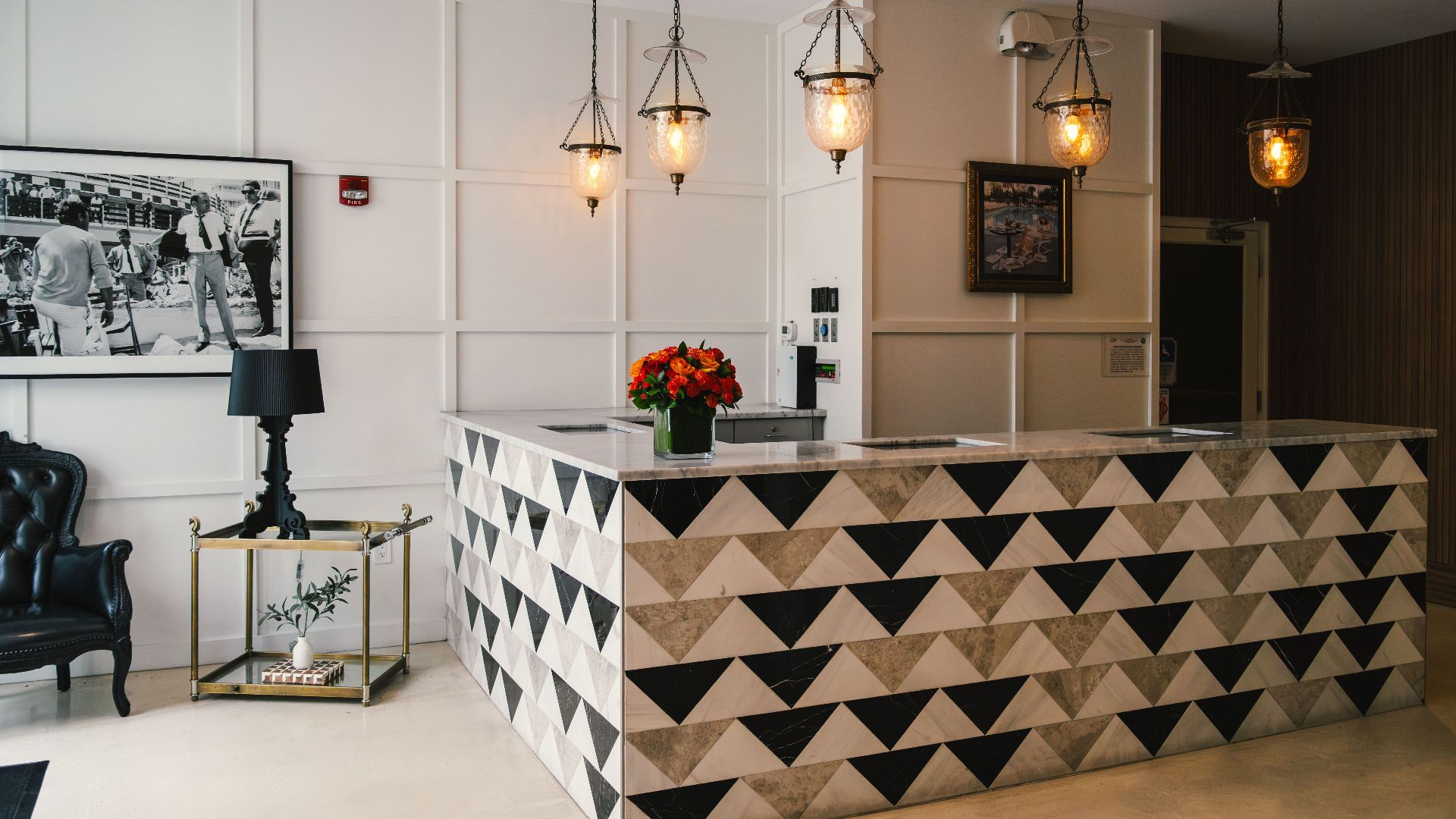 Explore the elegant reception area of a Miami Beach boutique hotel, showcasing modern coastal design and vibrant decor.