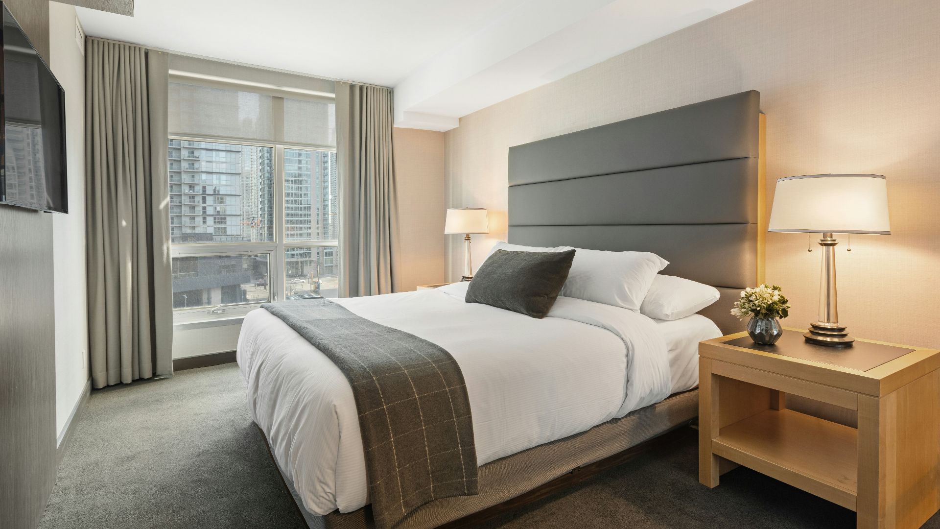white bed linen on bed