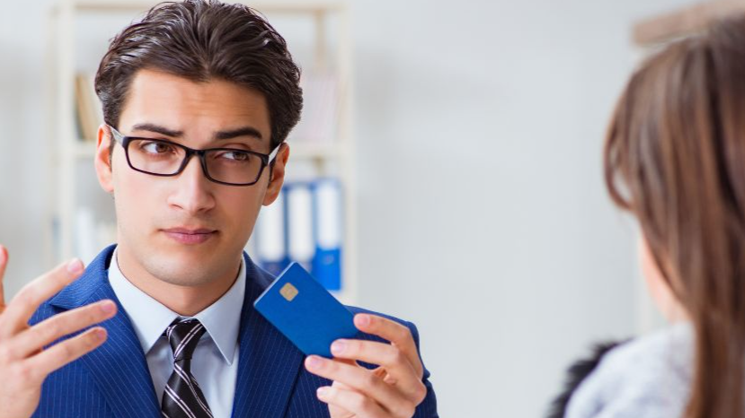 Woman makes payment with credit card