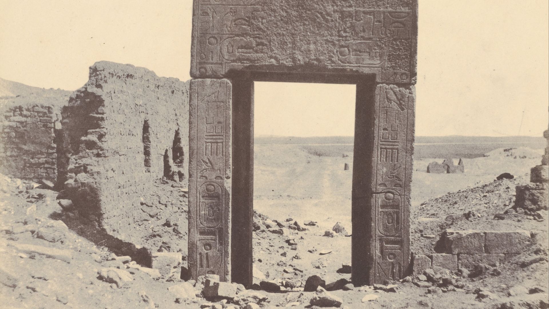 1854 photo of a pink granite gate, by John Beasley Greene