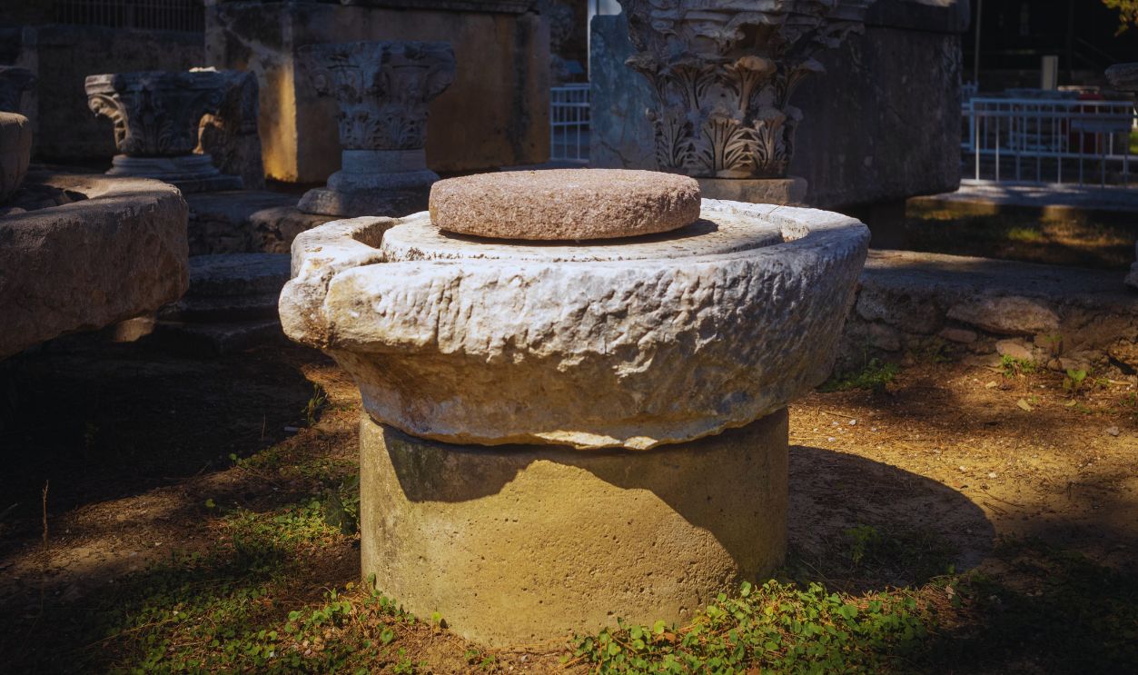 Gettyimages - 1559288879, Roman olive oil grinding stone Side Museum