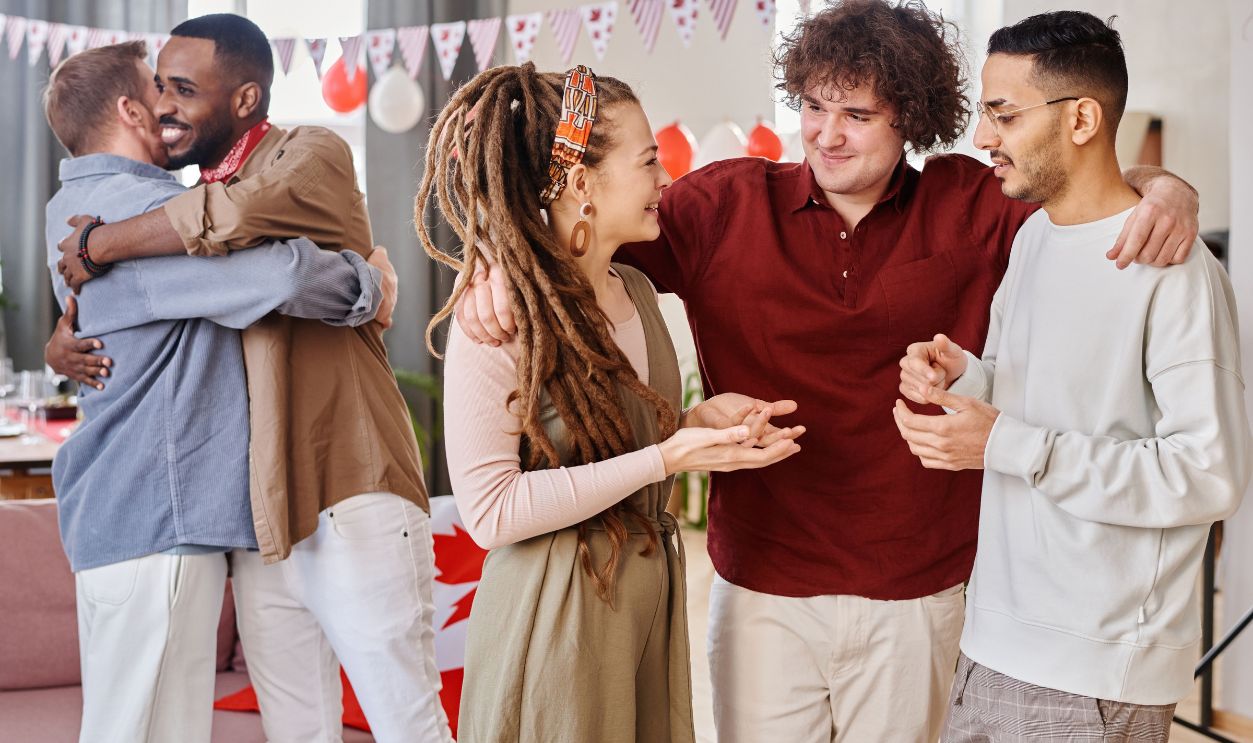A diverse group of friends enjoying a joyful indoor gathering