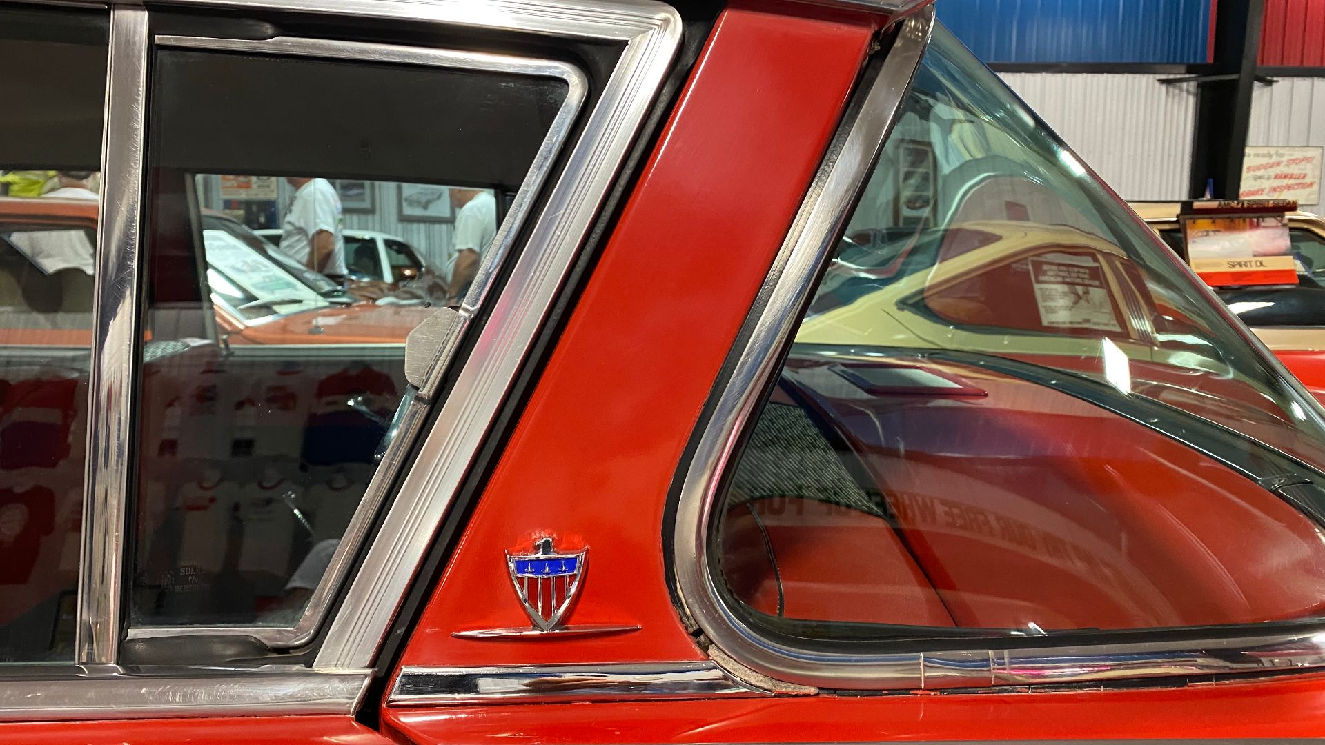 1960 Rambler Ambassador, a compact size (at the time) premium car made by American Motors Corporation (AMC). The 1960 Ambassadors featured smaller tailfins with larger taillights, slimmer A- and C-pillars that both angled rearward. New was a unique and ta