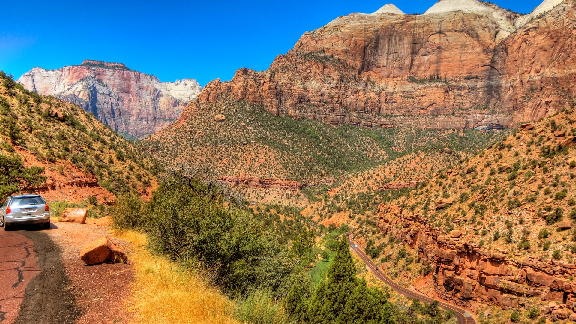Zion National Park is a United States National Park located in the Southwestern United States, near Springdale, Utah. A prominent feature of the 229-square-mile (593 km²) park is Zion Canyon, 15 miles (24 km) long and up to half a mile (800 m) deep, cut t
