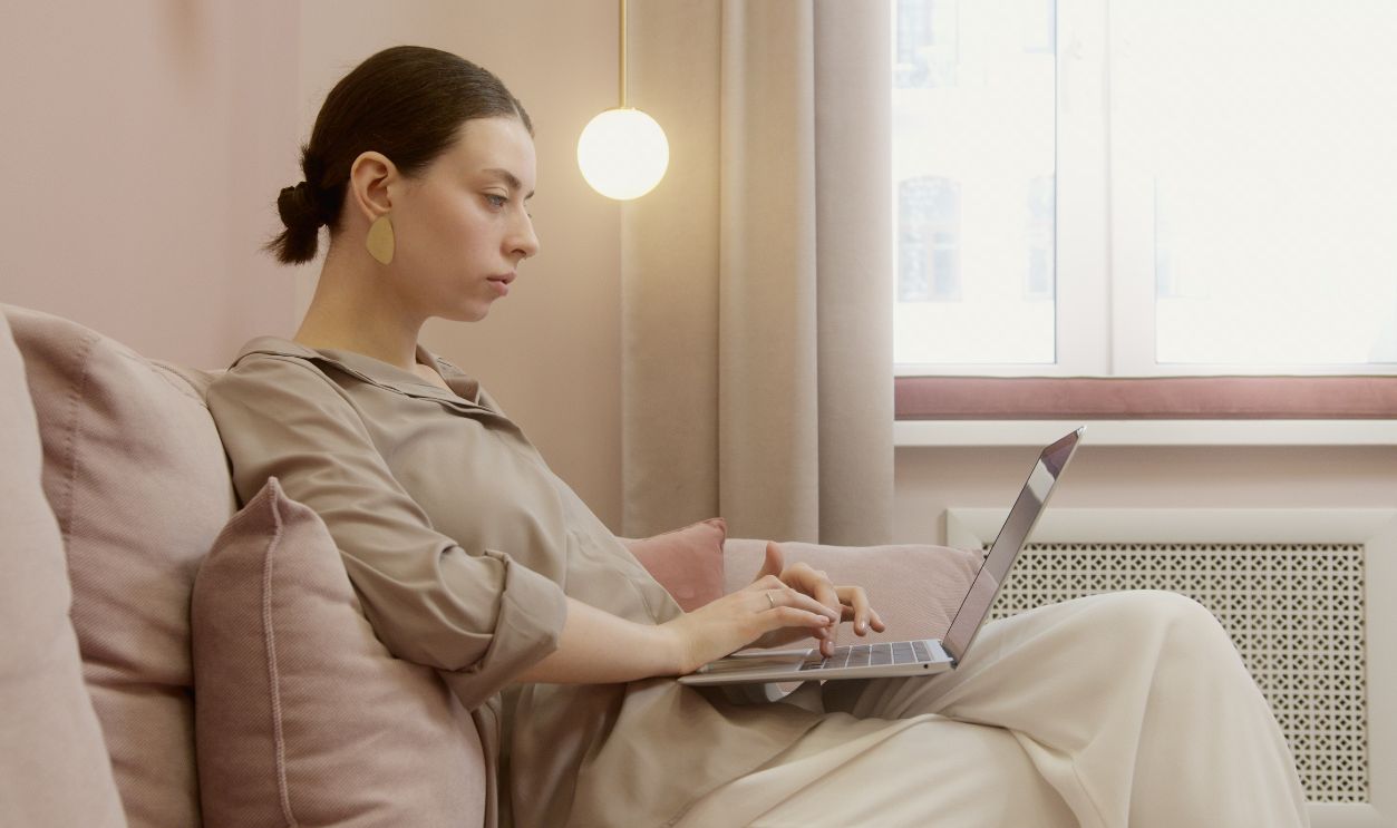 Woman Using Laptop
