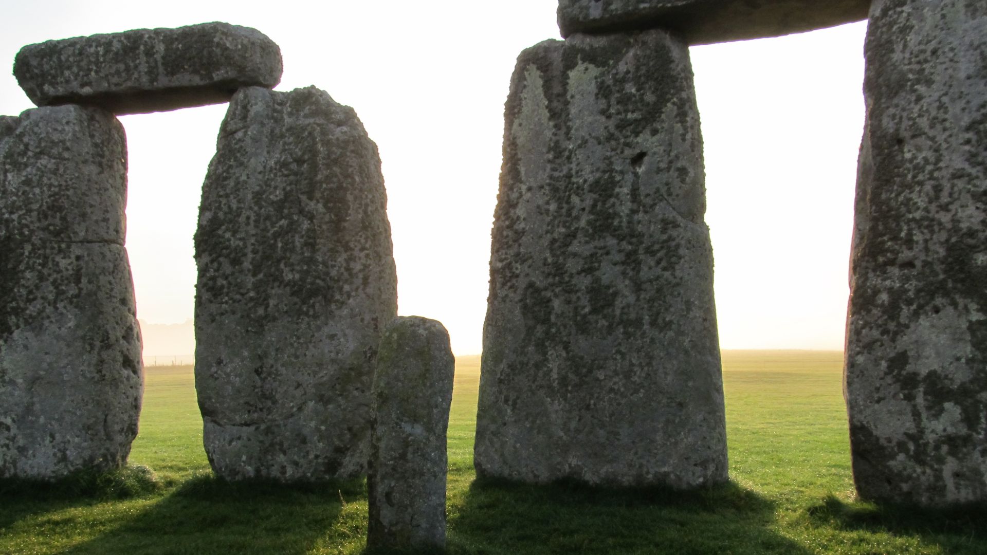 Standing in the shadows of the great Stonehenge during a fall sunrise.