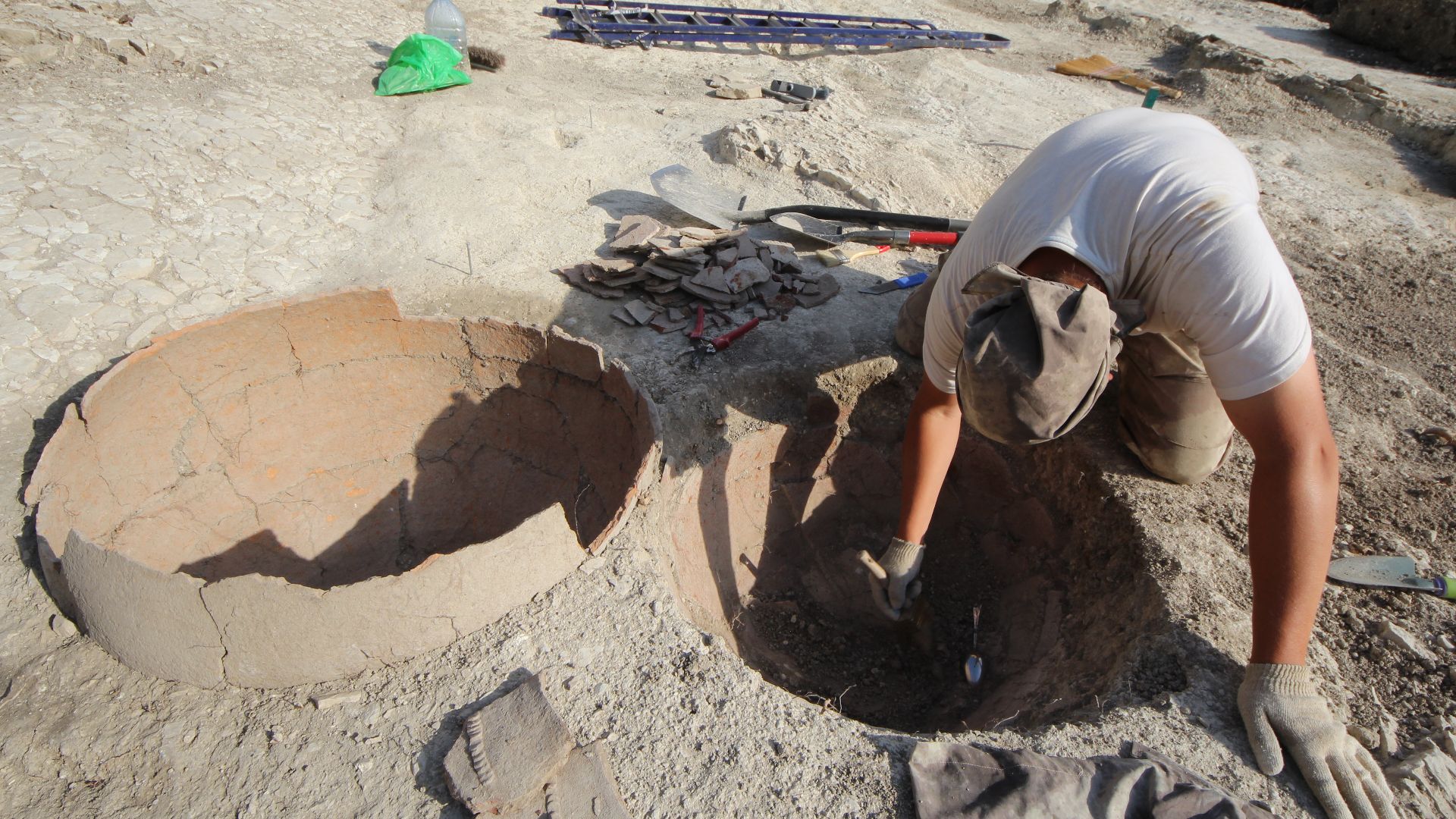 Archaeological field work, cleaning the findings