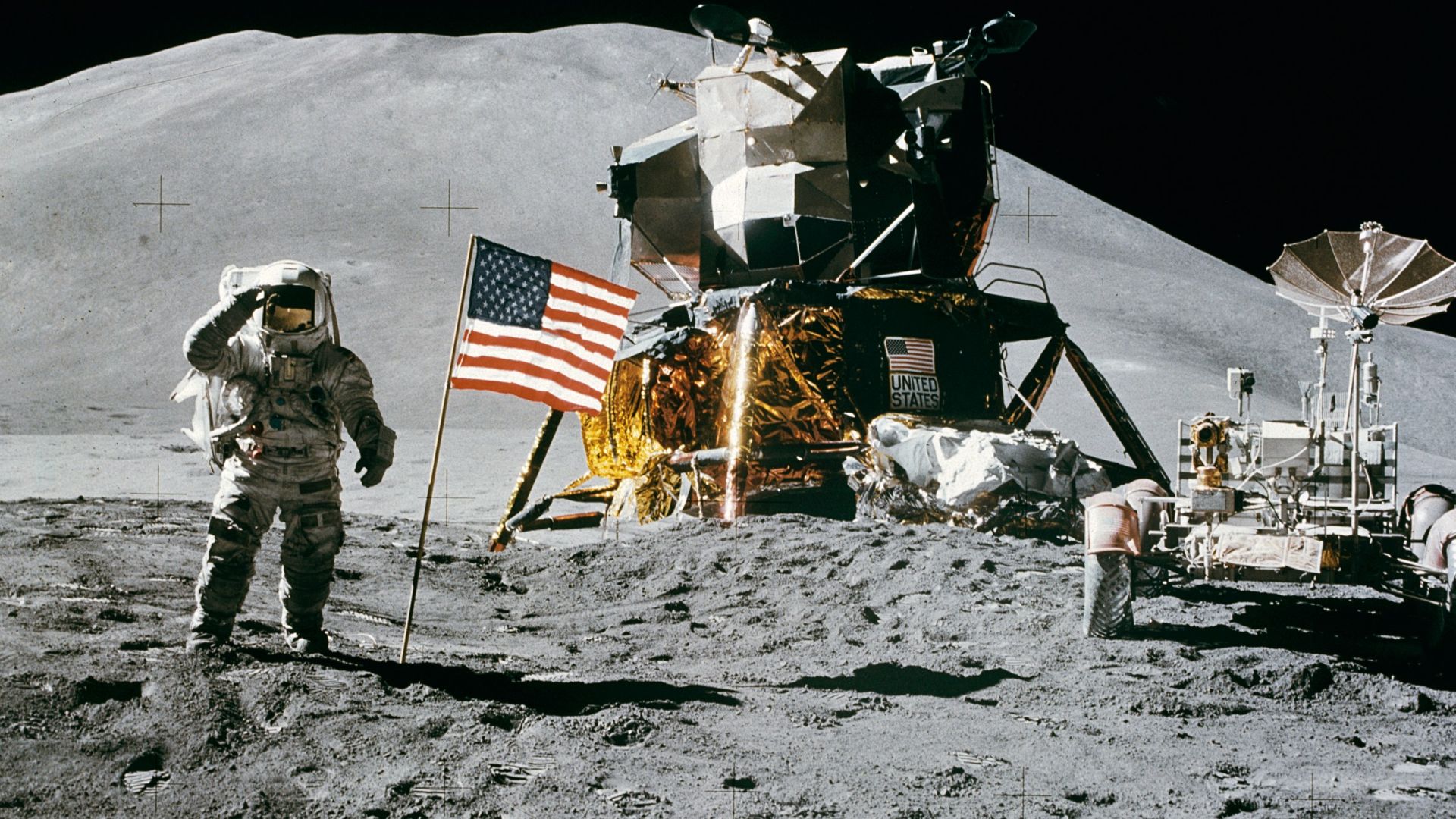 Apollo 15 Lunar Module Pilot James Irwin salutes the U.S. flag.Astronaut James B. Irwin, lunar module pilot, gives a military salute while standing beside the deployed U.S. flag during the Apollo 15 lunar surface extravehicular activity (EVA) at the Hadle