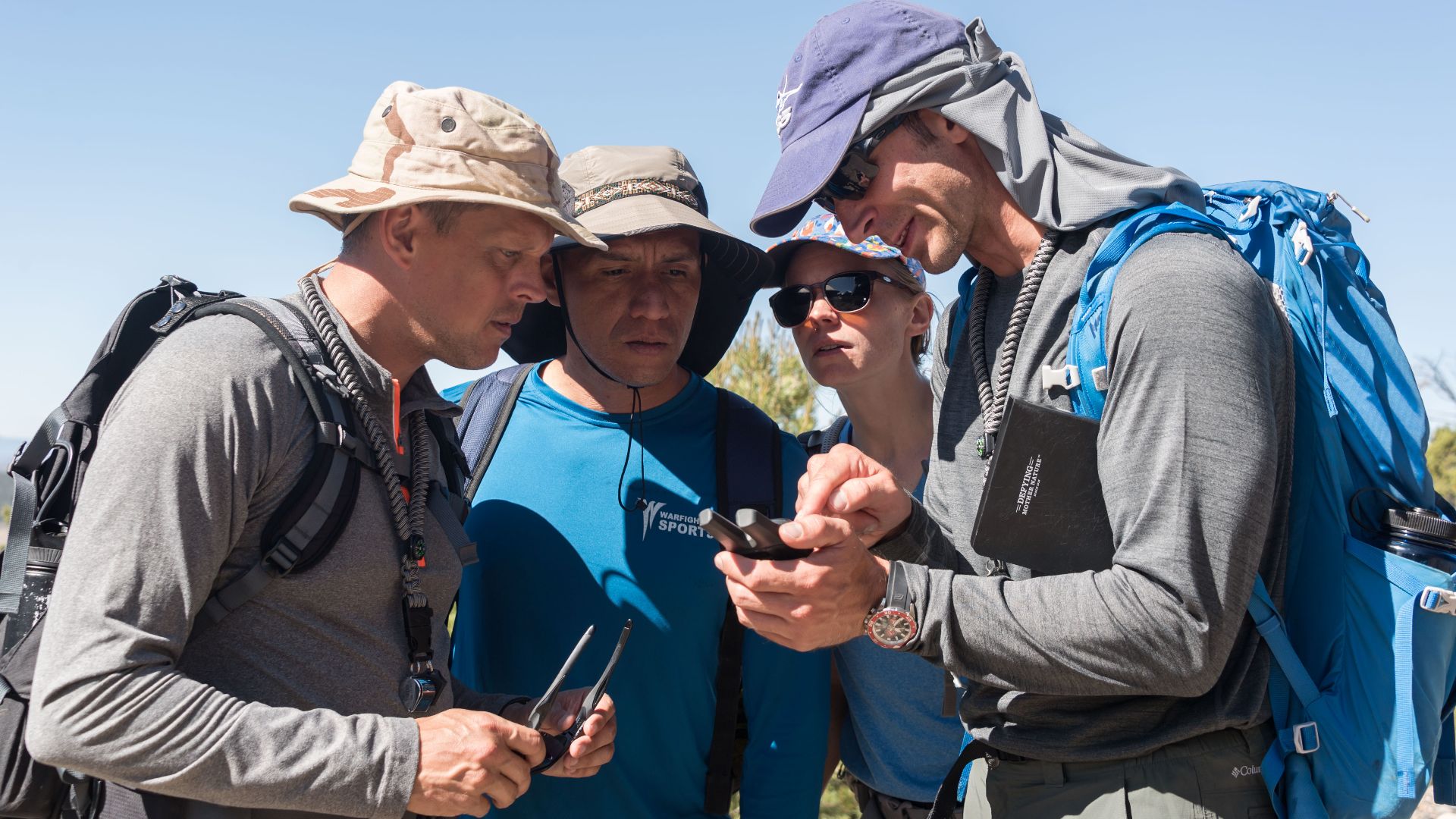 2017 NASA astronaut candidates Bob Hines, Frank Rubio, Zena Cardman follow the guidance of Canadian Space Agency astronaut candidate Joshua Kutryk during earth and planetary science training in Rio Grande del Norte National Monument Upper Gorge Area near