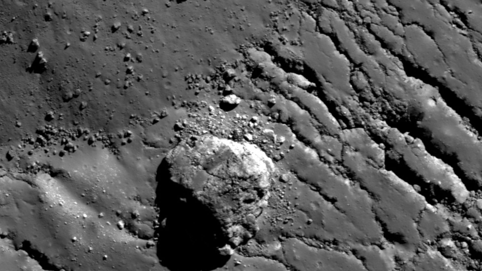 Tycho Central Peak Spectacular! Vertical view of Tycho central peak summit showing 120 m wide boulder, M127008391L [NASA/GSFC/Arizona State University].
On 10 June 2011 the LRO spacecraft slewed 65° to the west, allowing the LROC NACs to capture this dram