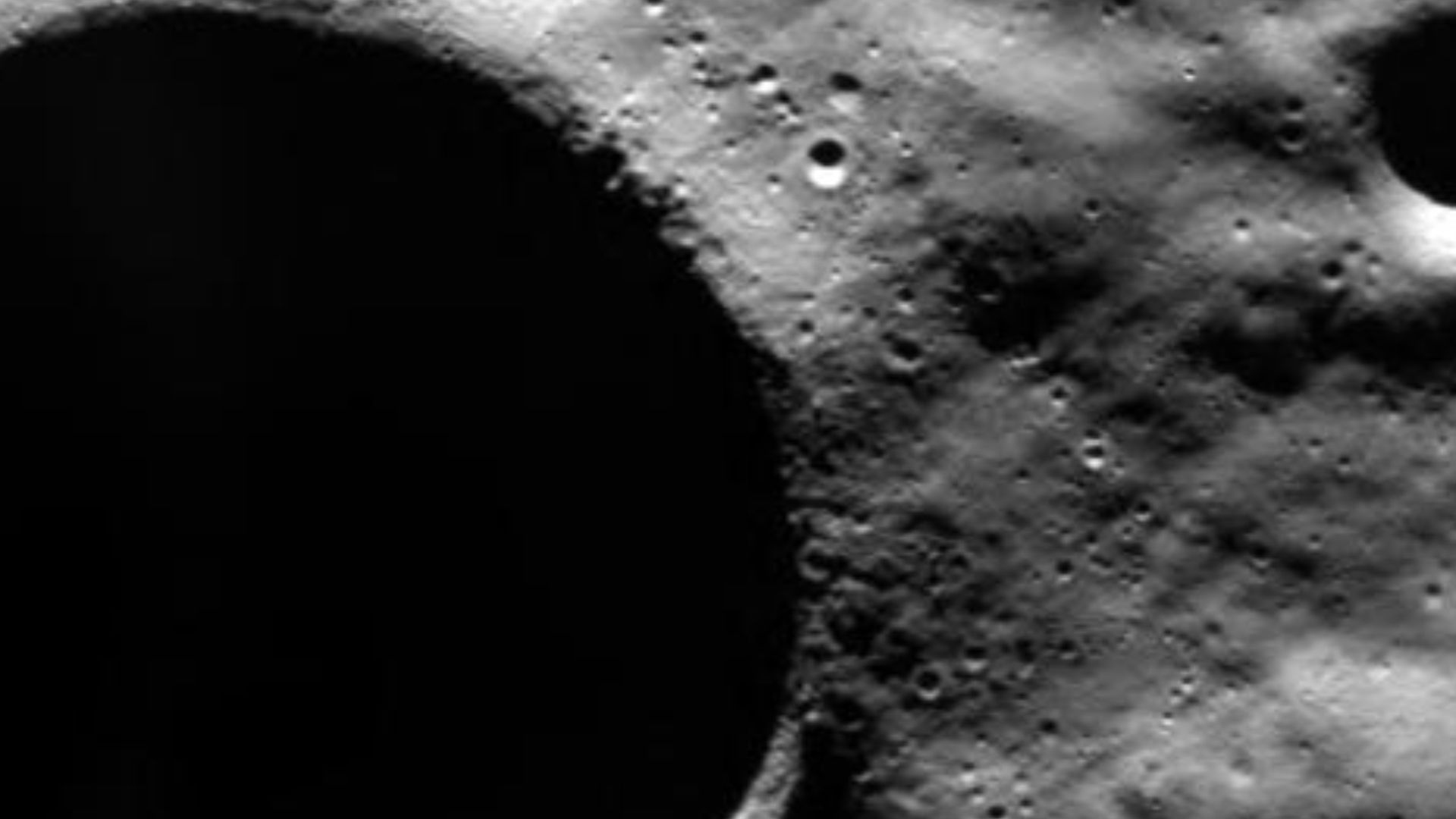 This image, taken by the advanced Moon Imaging Experiment (AMIE) on board ESA's SMART-1 spacecraft, shows crater Shackleton on the Moon.
AMIE obtained this image on 13 January 2006 - close to the time of lunar southern Summer - from a distance of 646 kilo
