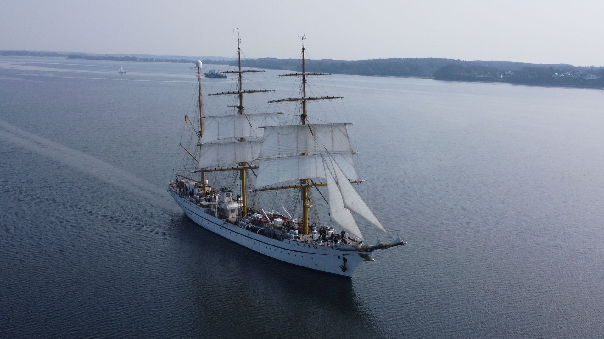The Gorch Fock is a tall ship of the German Navy (Deutsche Marine). In this picture taken  near Sønderhav at slow winds with a drone she is sailing, the Mars sails on the foremost two masts are hoisted.