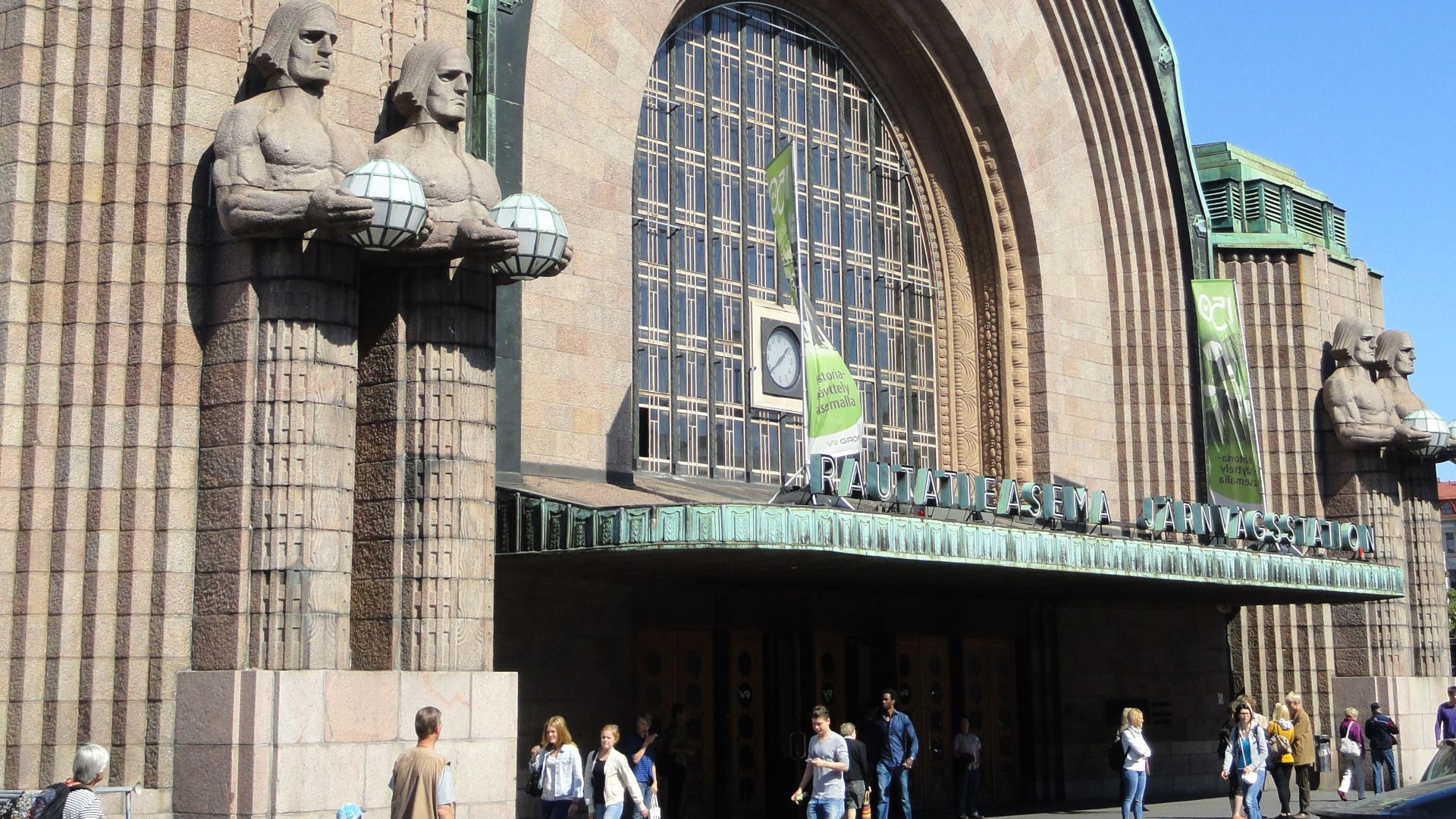 Helsinki Central railway station, Helsinki, Finland. Statues are now in the public domain because the artist died more than 70 years ago.