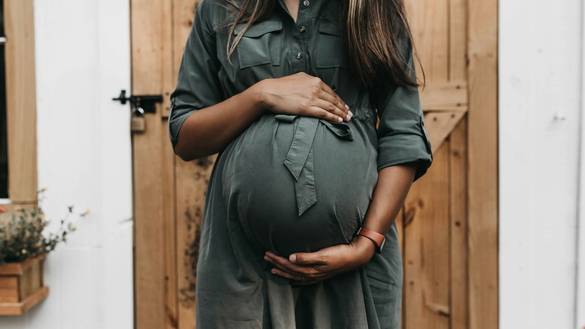 pregnant near door
