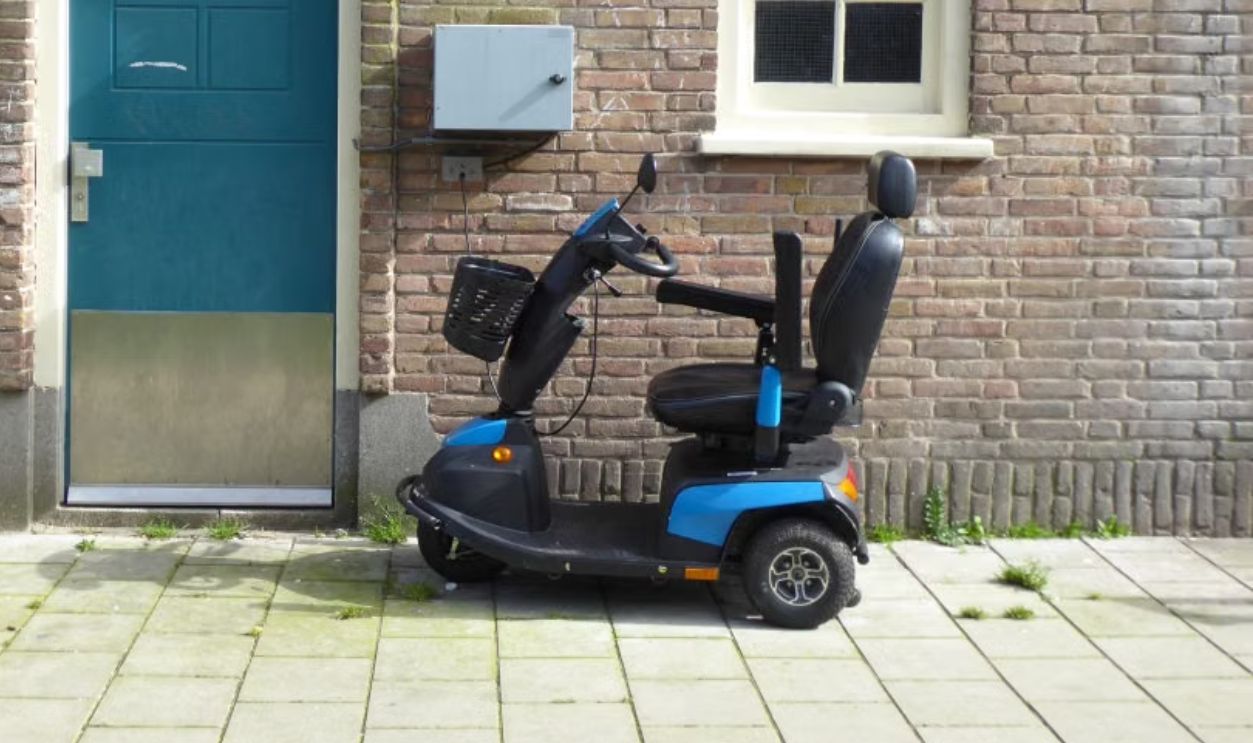 A blue mobility scooter 