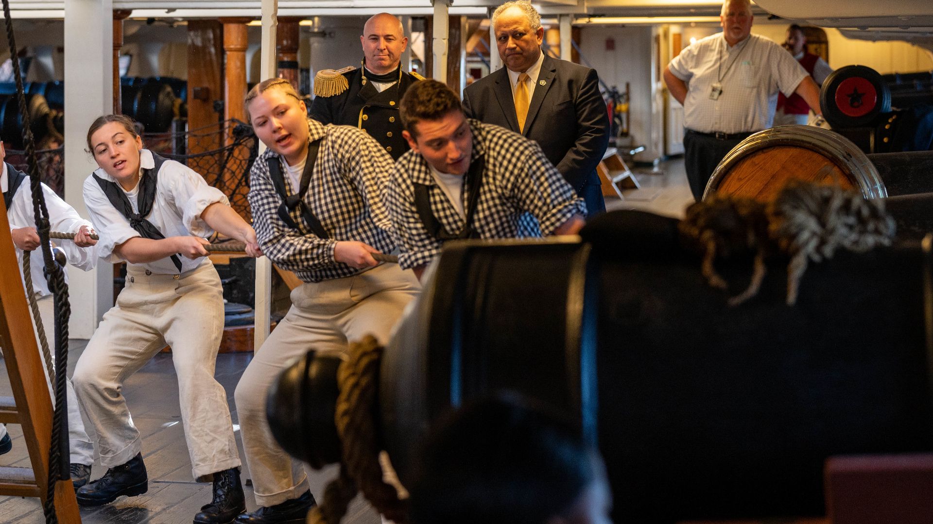 BOSTON (Oct. 13, 2021) — Secretary of the Navy Carlos Del Toro observes a gun drill with Cmdr. John Benda, commanding officer of USS Constitution, during a tour of the ship Oct. 13. Secretary Del Toro visited with the ship and crew to mark the Navy’s 246t