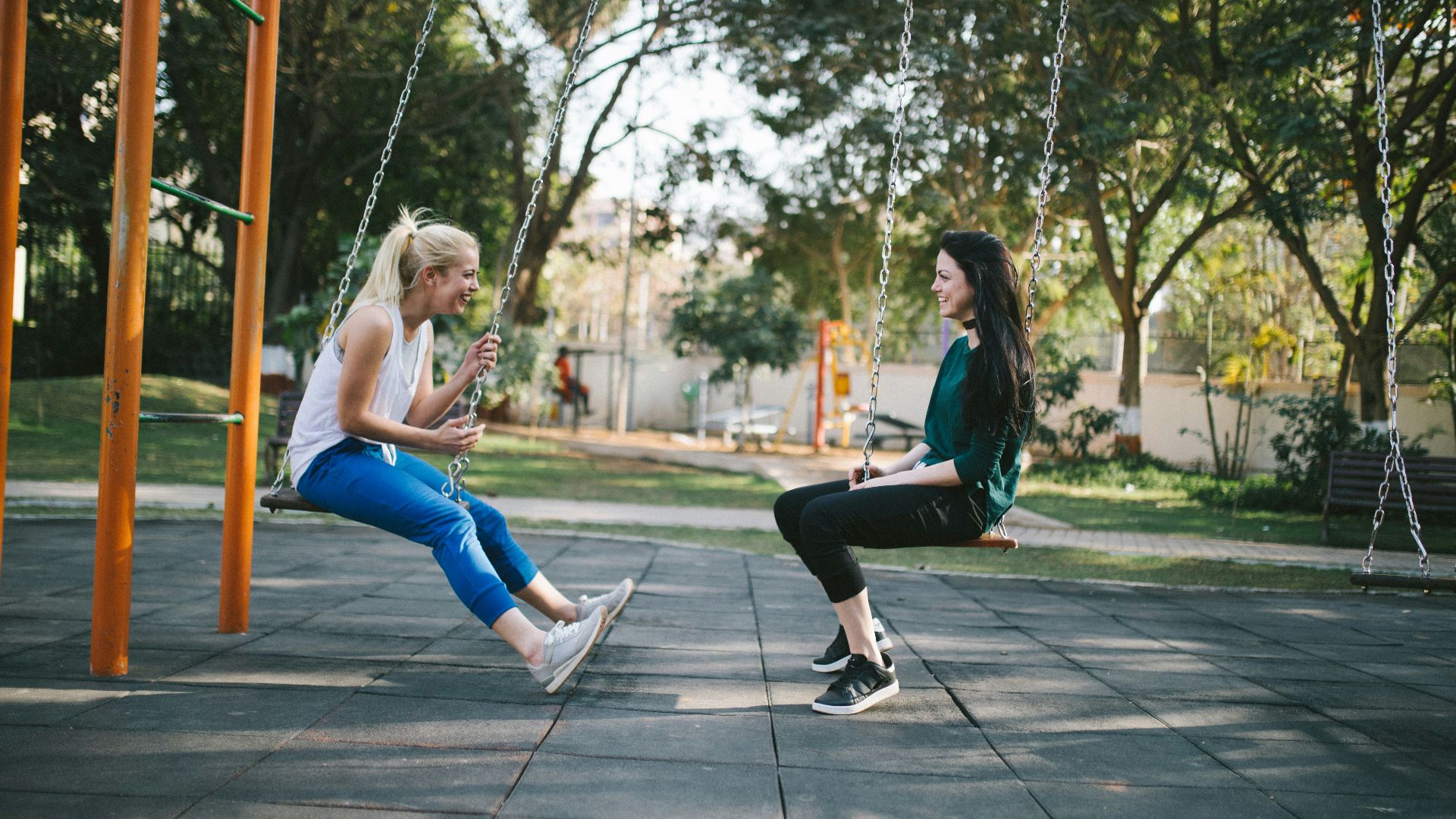 woman sitting on swing