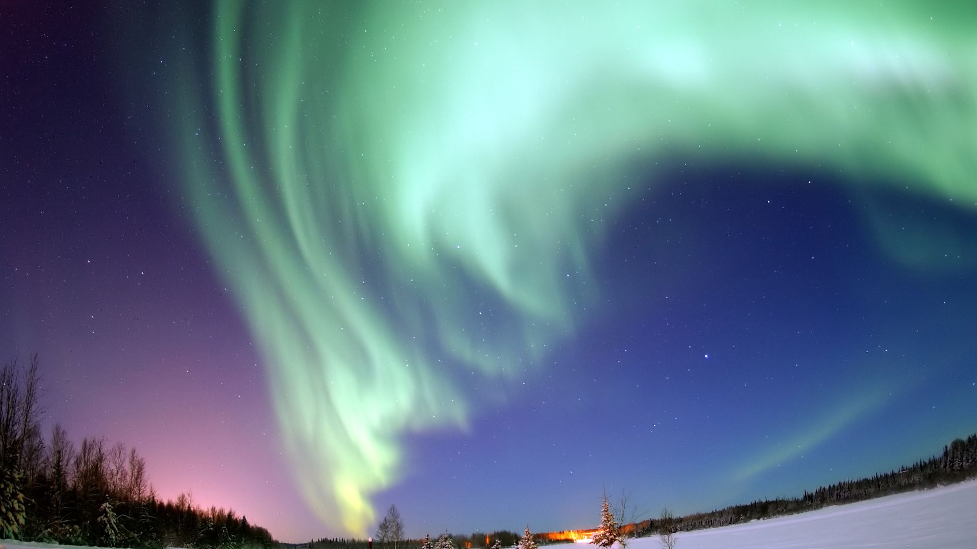 Eielson Air Force Base, Alaska — The Aurora Borealis, or Northern Lights, shines above Bear Lake